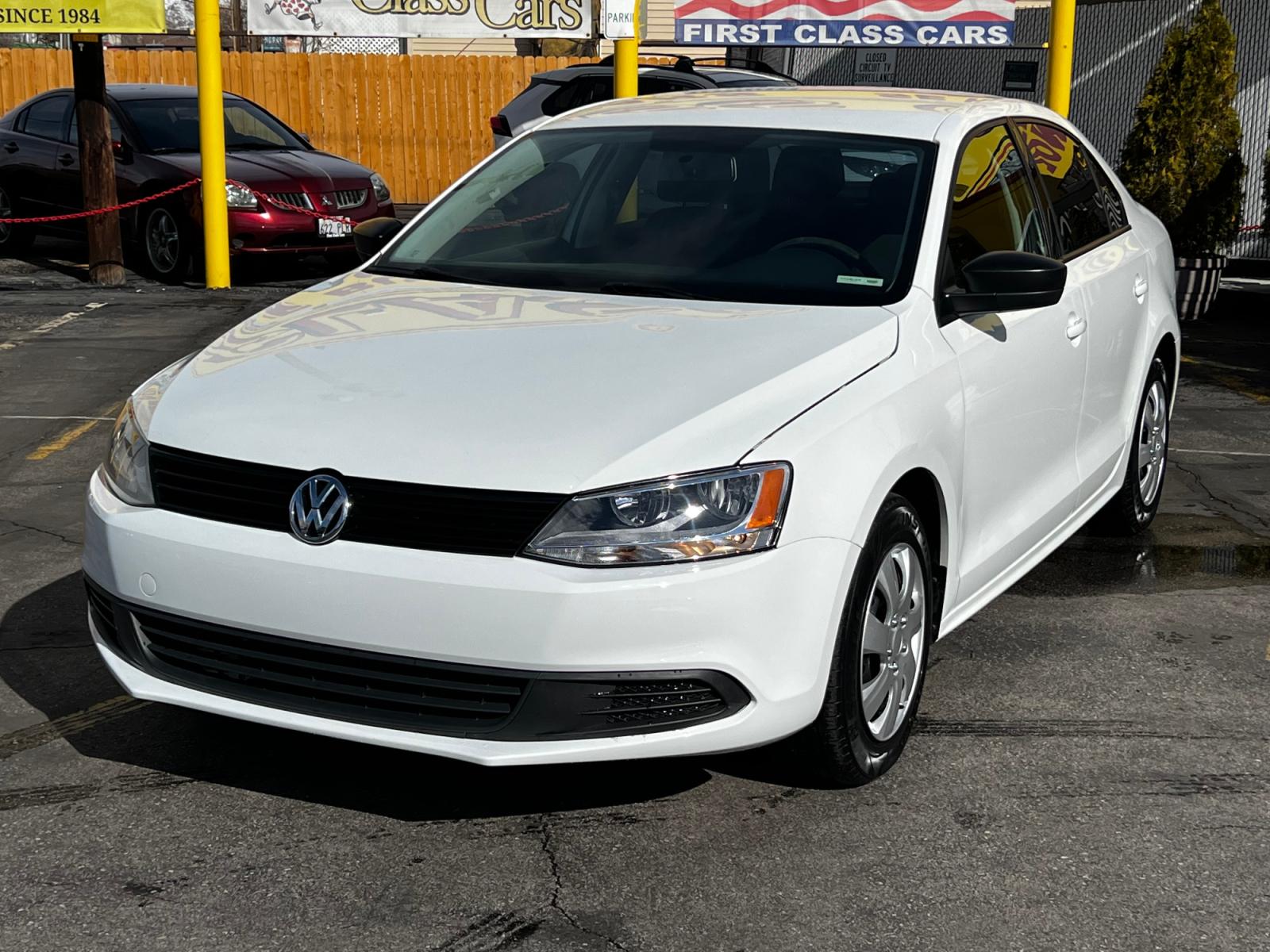 2014 Pure White /Gray Cloth Volkswagen Jetta S (3VW2K7AJ6EM) with an 2.0L 4 Cyl. engine, Automatic transmission, located at 801 South State Street, Salt Lake City, UT, 84111, (801) 328-0098, 40.751953, -111.888206 - Life is crazy. Now is the time to buy! All of our prices are just dollars above our cost. These prices will change as soon as life isn't so crazy. So please call or come in. We are here to save you a lot of money! Our service department is OPEN DAILY to help with any of your service needs. P - Photo #2