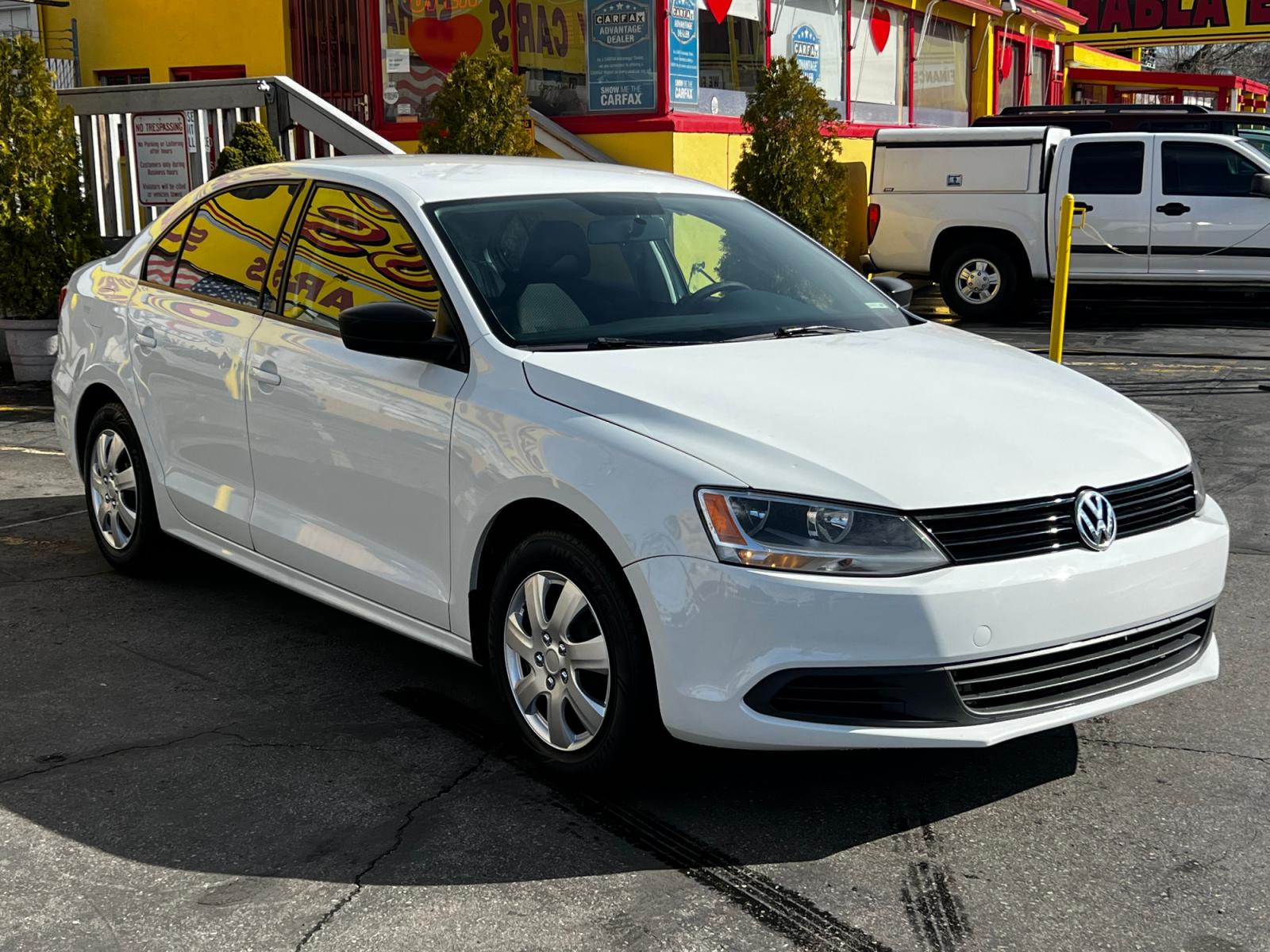 2014 Pure White /Gray Cloth Volkswagen Jetta S (3VW2K7AJ6EM) with an 2.0L 4 Cyl. engine, Automatic transmission, located at 801 South State Street, Salt Lake City, UT, 84111, (801) 328-0098, 40.751953, -111.888206 - Life is crazy. Now is the time to buy! All of our prices are just dollars above our cost. These prices will change as soon as life isn't so crazy. So please call or come in. We are here to save you a lot of money! Our service department is OPEN DAILY to help with any of your service needs. P - Photo #4