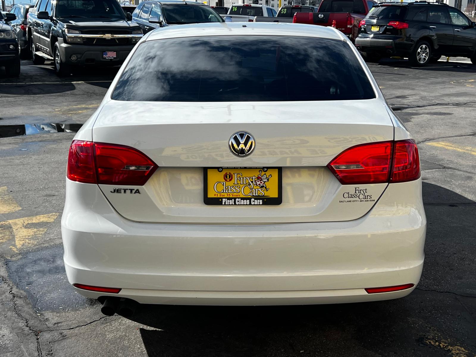 2014 Pure White /Gray Cloth Volkswagen Jetta S (3VW2K7AJ6EM) with an 2.0L 4 Cyl. engine, Automatic transmission, located at 801 South State Street, Salt Lake City, UT, 84111, (801) 328-0098, 40.751953, -111.888206 - Life is crazy. Now is the time to buy! All of our prices are just dollars above our cost. These prices will change as soon as life isn't so crazy. So please call or come in. We are here to save you a lot of money! Our service department is OPEN DAILY to help with any of your service needs. P - Photo #7
