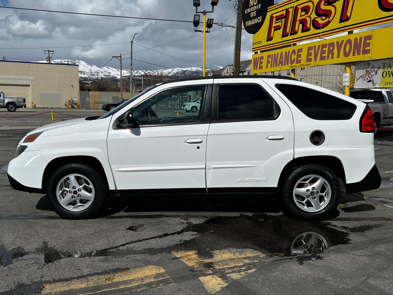 2004 Olympic White /Gray Cloth Pontiac Aztek AWD (3G7DB03E74S) with an 3.4L V6 engine, Automatic transmission, located at 801 South State Street, Salt Lake City, UT, 84111, (801) 328-0098, 40.751953, -111.888206 - Life is crazy. Now is the time to buy! All of our prices are just dollars above our cost. These prices will change as soon as life isn't so crazy. So please call or come in. We are here to save you a lot of money! Our service department is OPEN DAILY to help with any of your service needs. P - Photo #1