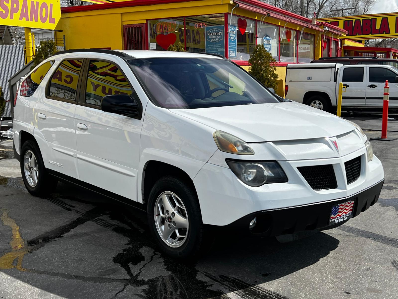 2004 Olympic White /Gray Cloth Pontiac Aztek AWD (3G7DB03E74S) with an 3.4L V6 engine, Automatic transmission, located at 801 South State Street, Salt Lake City, UT, 84111, (801) 328-0098, 40.751953, -111.888206 - Life is crazy. Now is the time to buy! All of our prices are just dollars above our cost. These prices will change as soon as life isn't so crazy. So please call or come in. We are here to save you a lot of money! Our service department is OPEN DAILY to help with any of your service needs. P - Photo #4