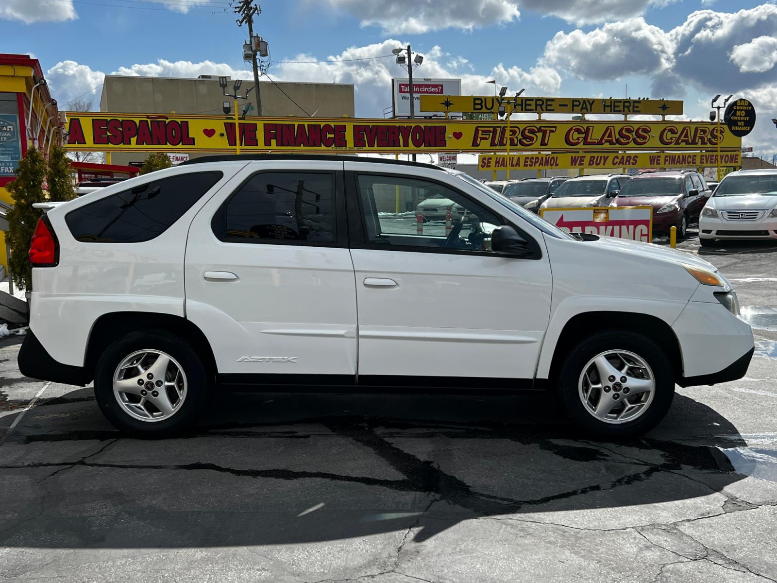 2004 Olympic White /Gray Cloth Pontiac Aztek AWD (3G7DB03E74S) with an 3.4L V6 engine, Automatic transmission, located at 801 South State Street, Salt Lake City, UT, 84111, (801) 328-0098, 40.751953, -111.888206 - Life is crazy. Now is the time to buy! All of our prices are just dollars above our cost. These prices will change as soon as life isn't so crazy. So please call or come in. We are here to save you a lot of money! Our service department is OPEN DAILY to help with any of your service needs. P - Photo #5