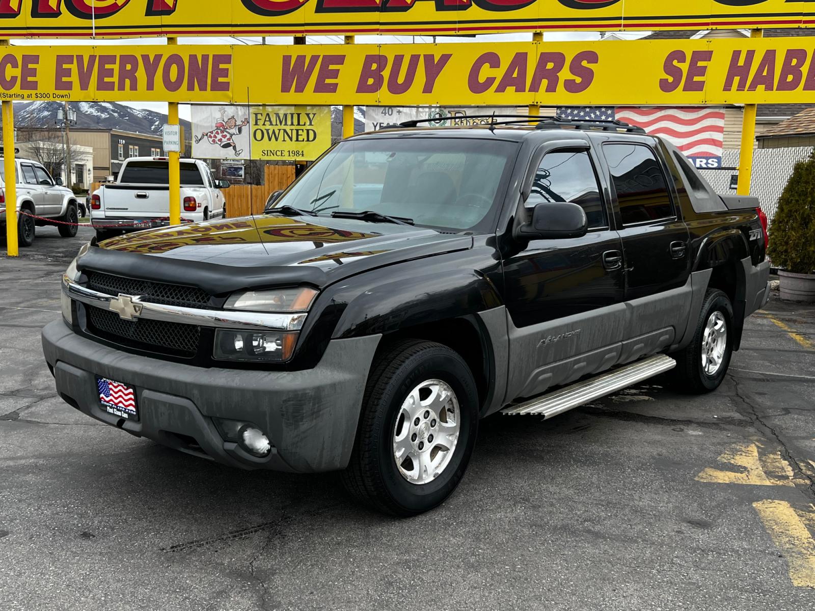 2002 Black /Black Leather Chevrolet Avalanche Z71 1500 4WD (3GNEK13T92G) with an 5.3L V8 engine, Automatic transmission, located at 801 South State Street, Salt Lake City, UT, 84111, (801) 328-0098, 40.751953, -111.888206 - Life is crazy. Now is the time to buy! All of our prices are just dollars above our cost. These prices will change as soon as life isn't so crazy. So please call or come in. We are here to save you a lot of money! Our service department is OPEN DAILY to help with any of your service needs. P - Photo #0