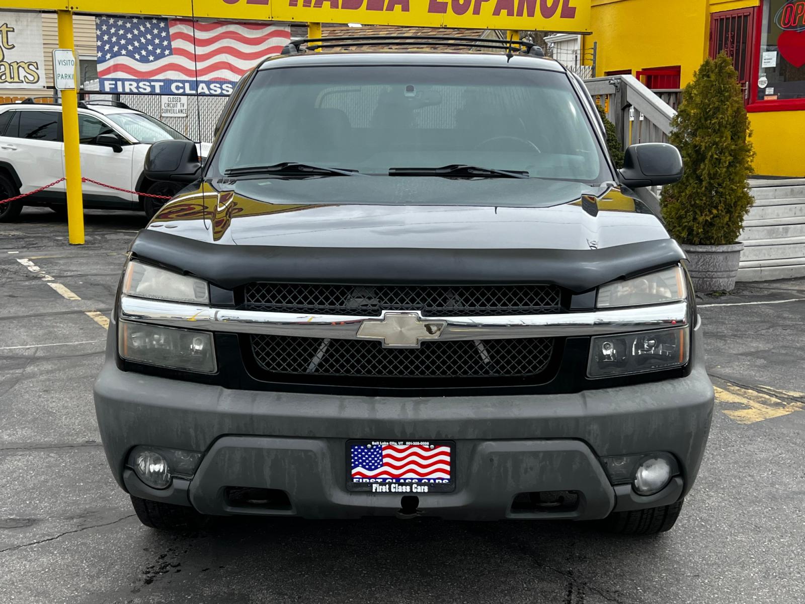 2002 Black /Black Leather Chevrolet Avalanche Z71 1500 4WD (3GNEK13T92G) with an 5.3L V8 engine, Automatic transmission, located at 801 South State Street, Salt Lake City, UT, 84111, (801) 328-0098, 40.751953, -111.888206 - Life is crazy. Now is the time to buy! All of our prices are just dollars above our cost. These prices will change as soon as life isn't so crazy. So please call or come in. We are here to save you a lot of money! Our service department is OPEN DAILY to help with any of your service needs. P - Photo #3