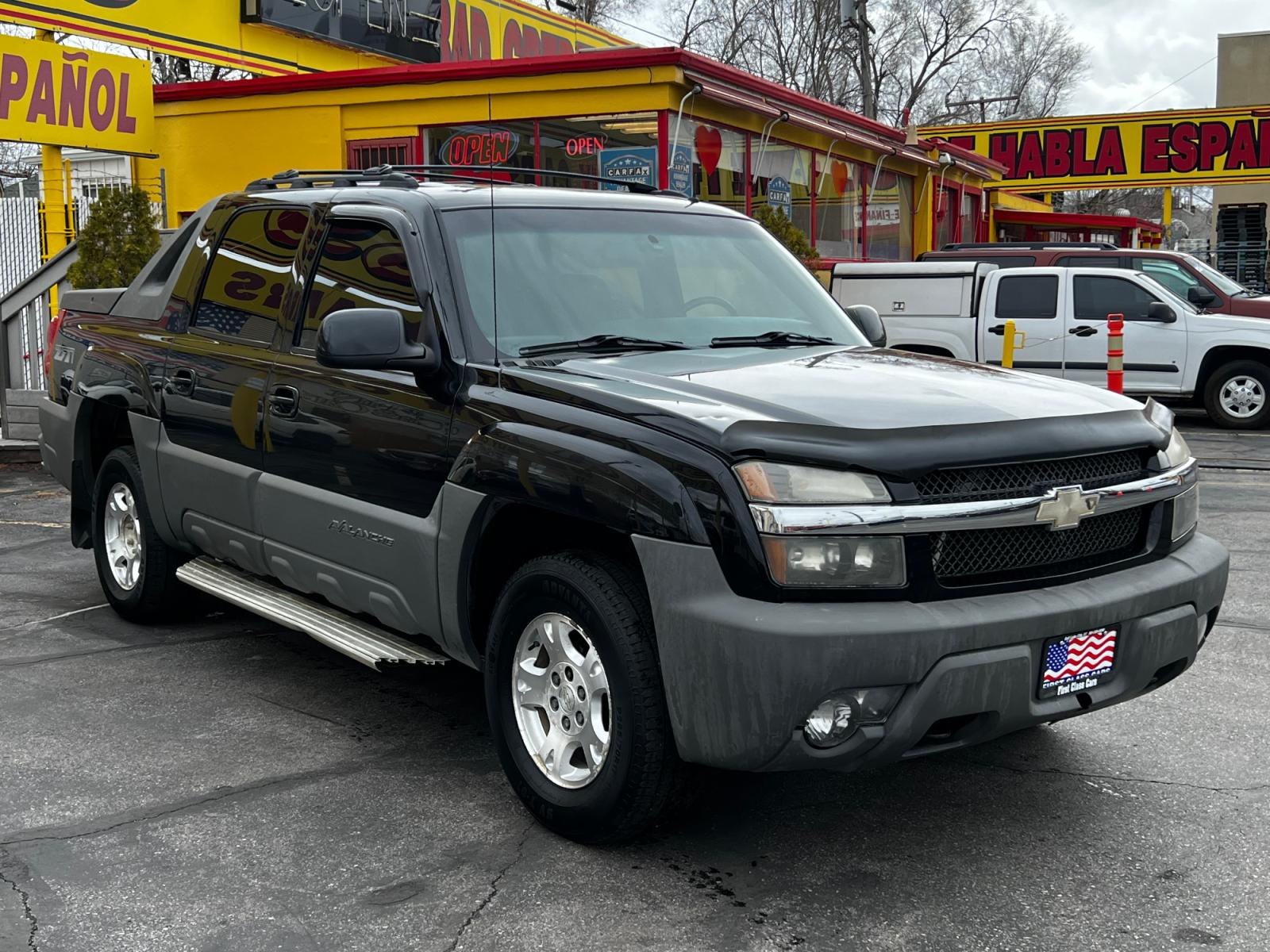 2002 Black /Black Leather Chevrolet Avalanche Z71 1500 4WD (3GNEK13T92G) with an 5.3L V8 engine, Automatic transmission, located at 801 South State Street, Salt Lake City, UT, 84111, (801) 328-0098, 40.751953, -111.888206 - Life is crazy. Now is the time to buy! All of our prices are just dollars above our cost. These prices will change as soon as life isn't so crazy. So please call or come in. We are here to save you a lot of money! Our service department is OPEN DAILY to help with any of your service needs. P - Photo #4