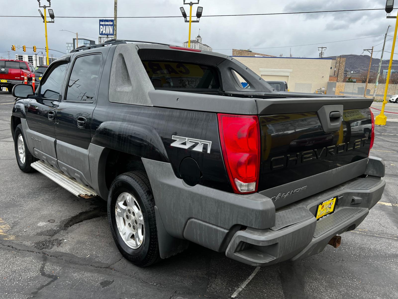 2002 Black /Black Leather Chevrolet Avalanche Z71 1500 4WD (3GNEK13T92G) with an 5.3L V8 engine, Automatic transmission, located at 801 South State Street, Salt Lake City, UT, 84111, (801) 328-0098, 40.751953, -111.888206 - Life is crazy. Now is the time to buy! All of our prices are just dollars above our cost. These prices will change as soon as life isn't so crazy. So please call or come in. We are here to save you a lot of money! Our service department is OPEN DAILY to help with any of your service needs. P - Photo #8