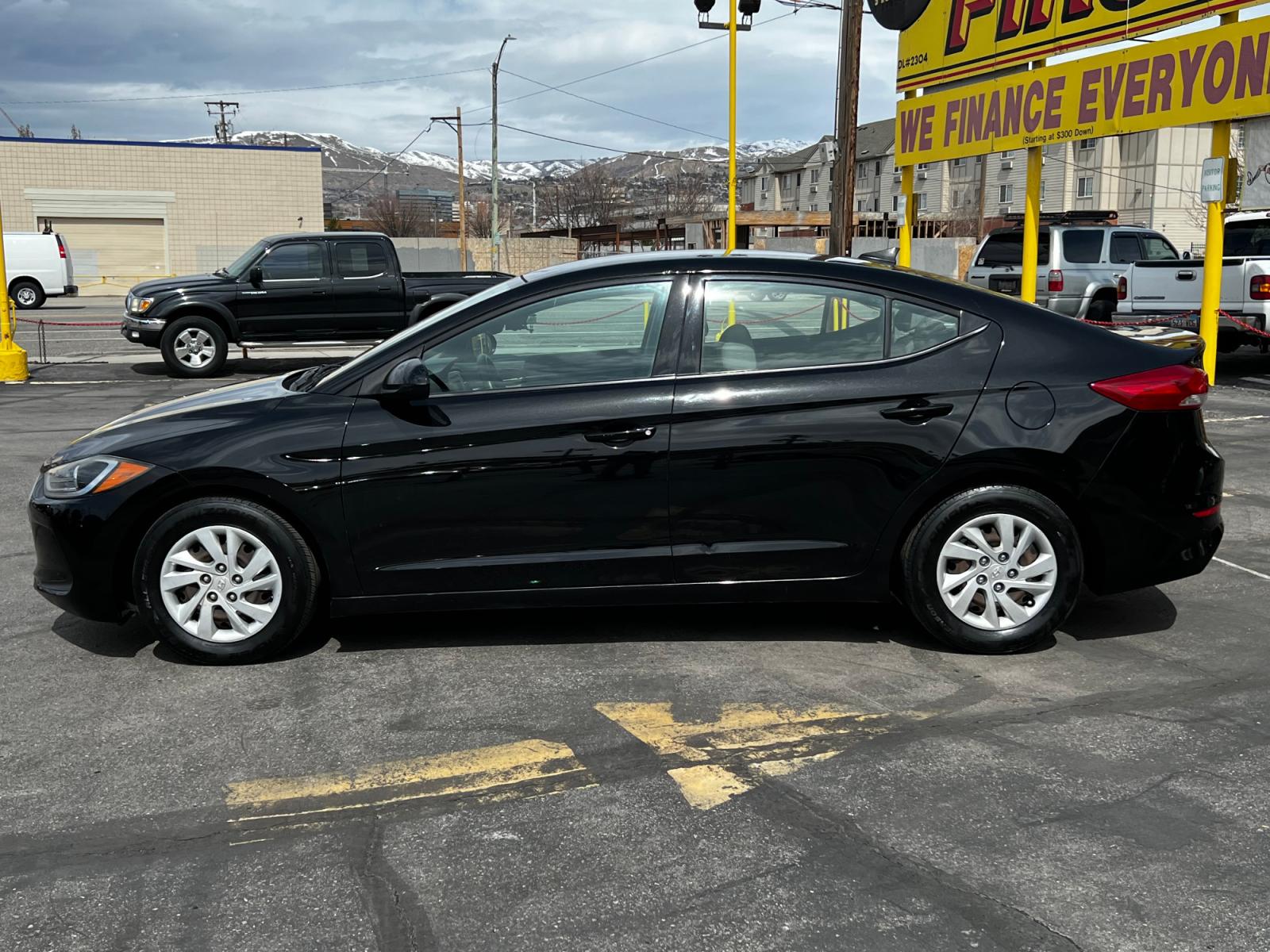 2017 Black Noir Pearl /Gray Cloth Hyundai Elantra SE (5NPD74LF8HH) with an 1.8L 4 Cyl. engine, Automatic transmission, located at 801 South State Street, Salt Lake City, UT, 84111, (801) 328-0098, 40.751953, -111.888206 - Life is crazy. Now is the time to buy! All of our prices are just dollars above our cost. These prices will change as soon as life isn't so crazy. So please call or come in. We are here to save you a lot of money! Our service department is OPEN DAILY to help with any of your service needs. P - Photo #1