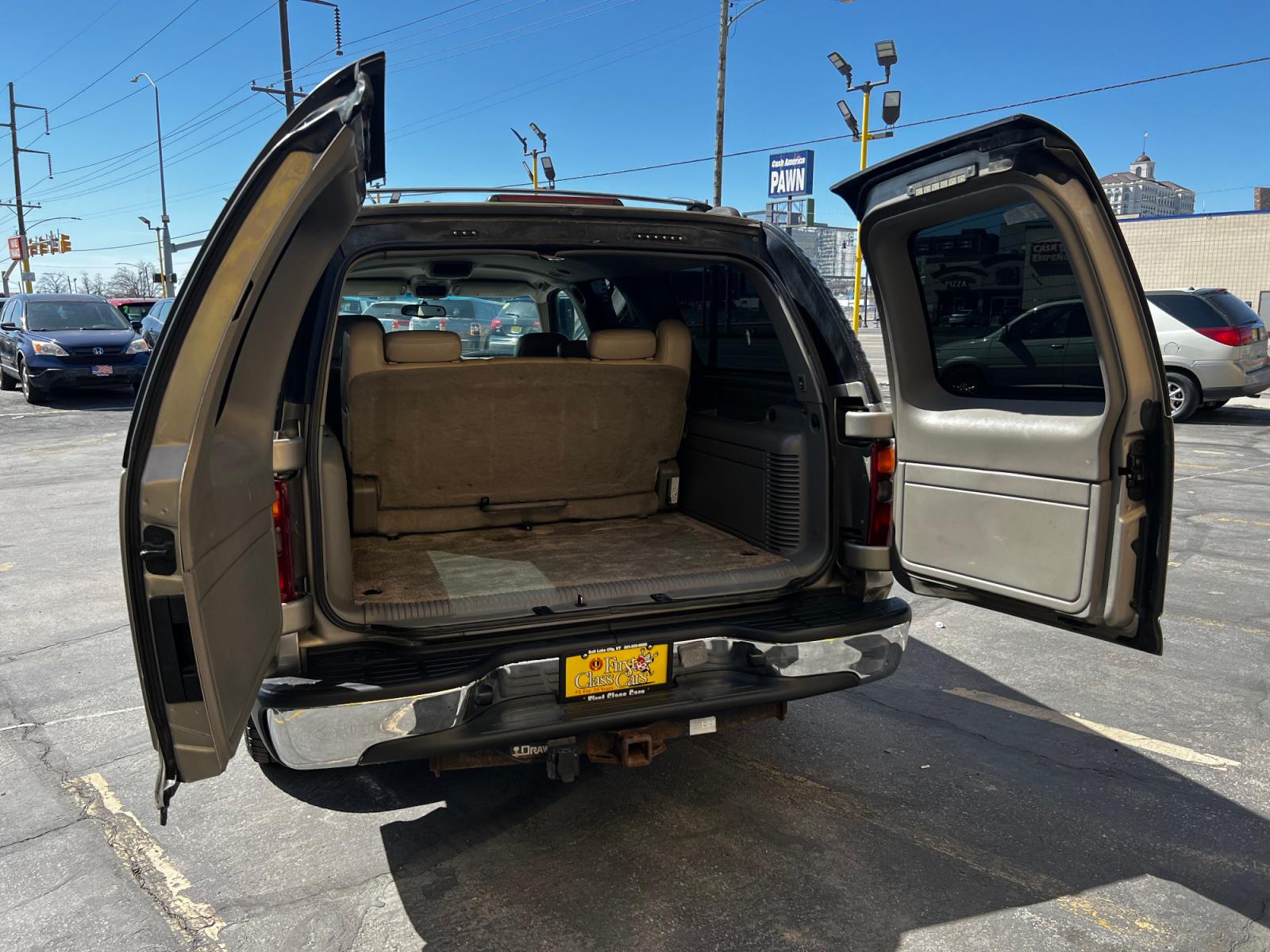 2001 Pewter Metallic /Tan Leather Chevrolet Suburban LT C1500 2WD (3GNEC16T41G) with an 5.3L V8 engine, Automatic transmission, located at 801 South State Street, Salt Lake City, UT, 84111, (801) 328-0098, 40.751953, -111.888206 - Life is crazy. Now is the time to buy! All of our prices are just dollars above our cost. These prices will change as soon as life isn't so crazy. So please call or come in. We are here to save you a lot of money! Our service department is OPEN DAILY to help with any of your service needs. - Photo #9