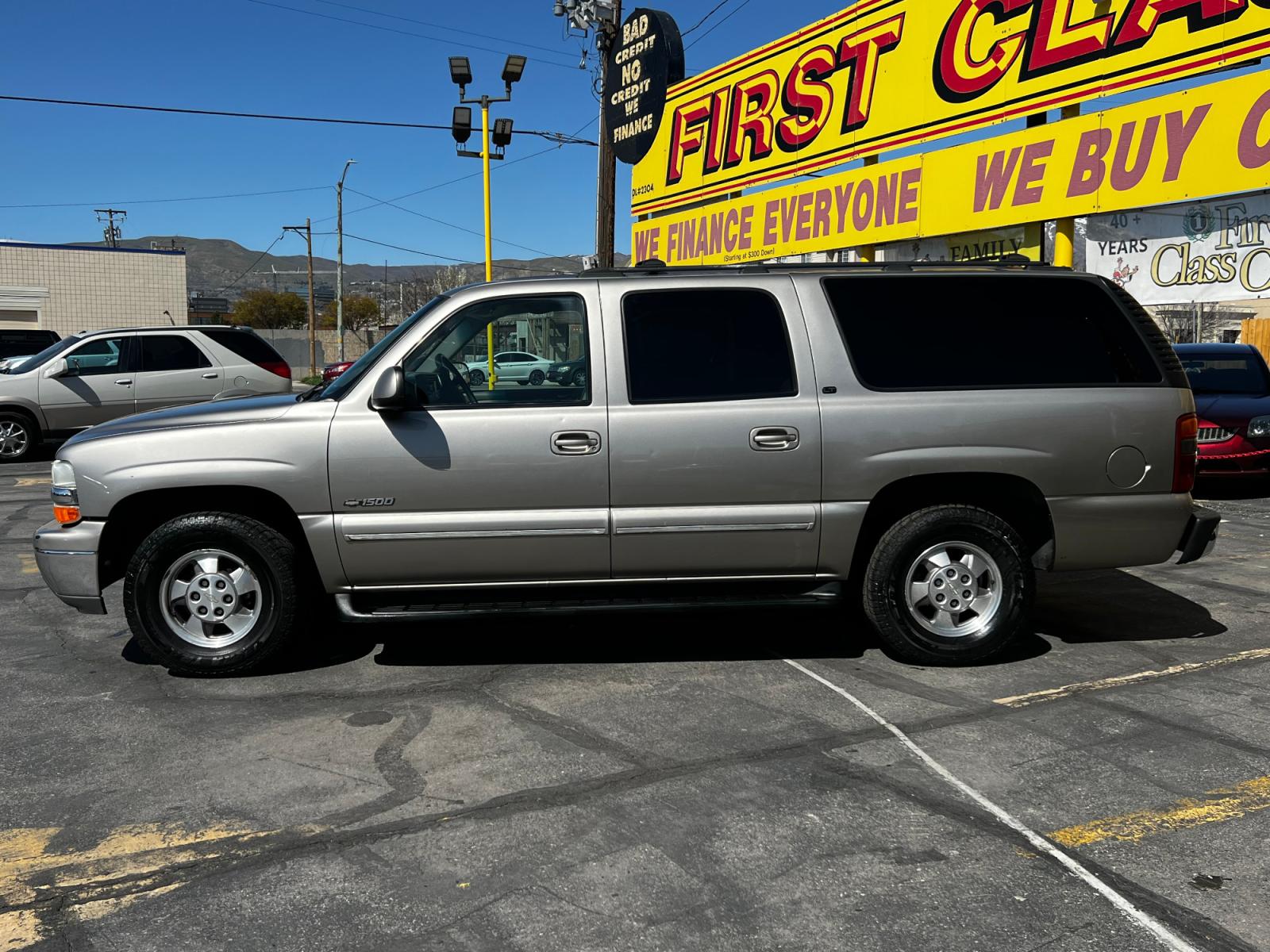 2001 Pewter Metallic /Tan Leather Chevrolet Suburban LT C1500 2WD (3GNEC16T41G) with an 5.3L V8 engine, Automatic transmission, located at 801 South State Street, Salt Lake City, UT, 84111, (801) 328-0098, 40.751953, -111.888206 - Life is crazy. Now is the time to buy! All of our prices are just dollars above our cost. These prices will change as soon as life isn't so crazy. So please call or come in. We are here to save you a lot of money! Our service department is OPEN DAILY to help with any of your service needs. - Photo #1
