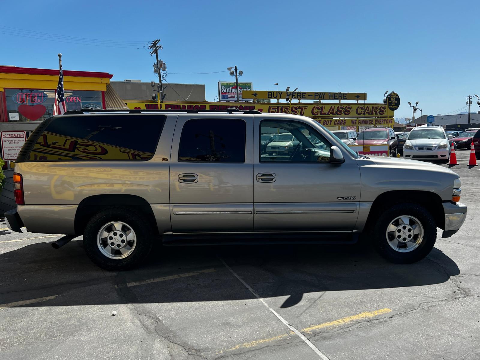 2001 Pewter Metallic /Tan Leather Chevrolet Suburban LT C1500 2WD (3GNEC16T41G) with an 5.3L V8 engine, Automatic transmission, located at 801 South State Street, Salt Lake City, UT, 84111, (801) 328-0098, 40.751953, -111.888206 - Life is crazy. Now is the time to buy! All of our prices are just dollars above our cost. These prices will change as soon as life isn't so crazy. So please call or come in. We are here to save you a lot of money! Our service department is OPEN DAILY to help with any of your service needs. - Photo #5