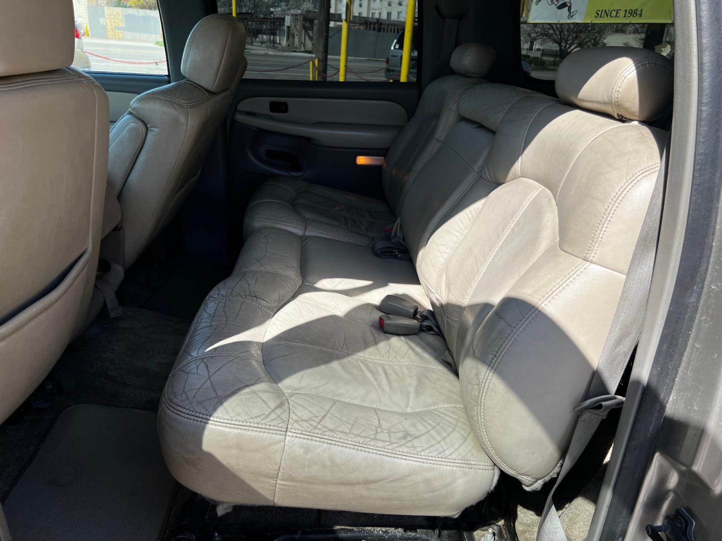 2001 Pewter Metallic /Tan Leather Chevrolet Suburban LT C1500 2WD (3GNEC16T41G) with an 5.3L V8 engine, Automatic transmission, located at 801 South State Street, Salt Lake City, UT, 84111, (801) 328-0098, 40.751953, -111.888206 - Life is crazy. Now is the time to buy! All of our prices are just dollars above our cost. These prices will change as soon as life isn't so crazy. So please call or come in. We are here to save you a lot of money! Our service department is OPEN DAILY to help with any of your service needs. P - Photo#24