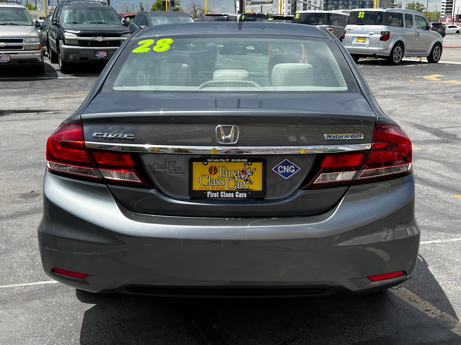 2013 Nimbus Gray Metallic /Gray Cloth Honda Civic CNG (19XFB5F56DE) with an 1.8L 4 Cyl. engine, Automatic transmission, located at 801 South State Street, Salt Lake City, UT, 84111, (801) 328-0098, 40.751953, -111.888206 - Life is crazy. Now is the time to buy! All of our prices are just dollars above our cost. These prices will change as soon as life isn't so crazy. So please call or come in. We are here to save you a lot of money! Our service department is OPEN DAILY to help with any of your service needs. P - Photo #7