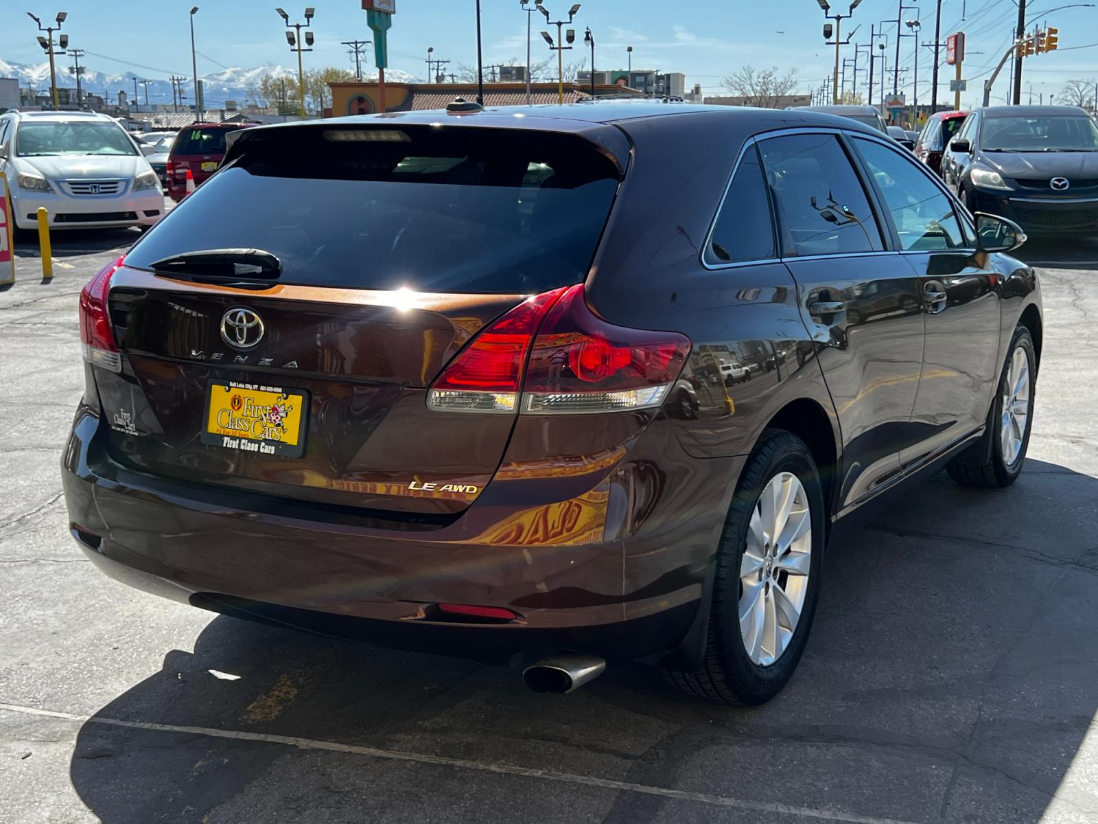 2013 Golden Umber Mica /Black Cloth Toyota Venza LE AWD (4T3BA3BB1DU) with an 2.7L 4 Cyl. engine, Automatic transmission, located at 801 South State Street, Salt Lake City, UT, 84111, (801) 328-0098, 40.751953, -111.888206 - Life is crazy. Now is the time to buy! All of our prices are just dollars above our cost. These prices will change as soon as life isn't so crazy. So please call or come in. We are here to save you a lot of money! Our service department is OPEN DAILY to help with any of your service needs. P - Photo #6
