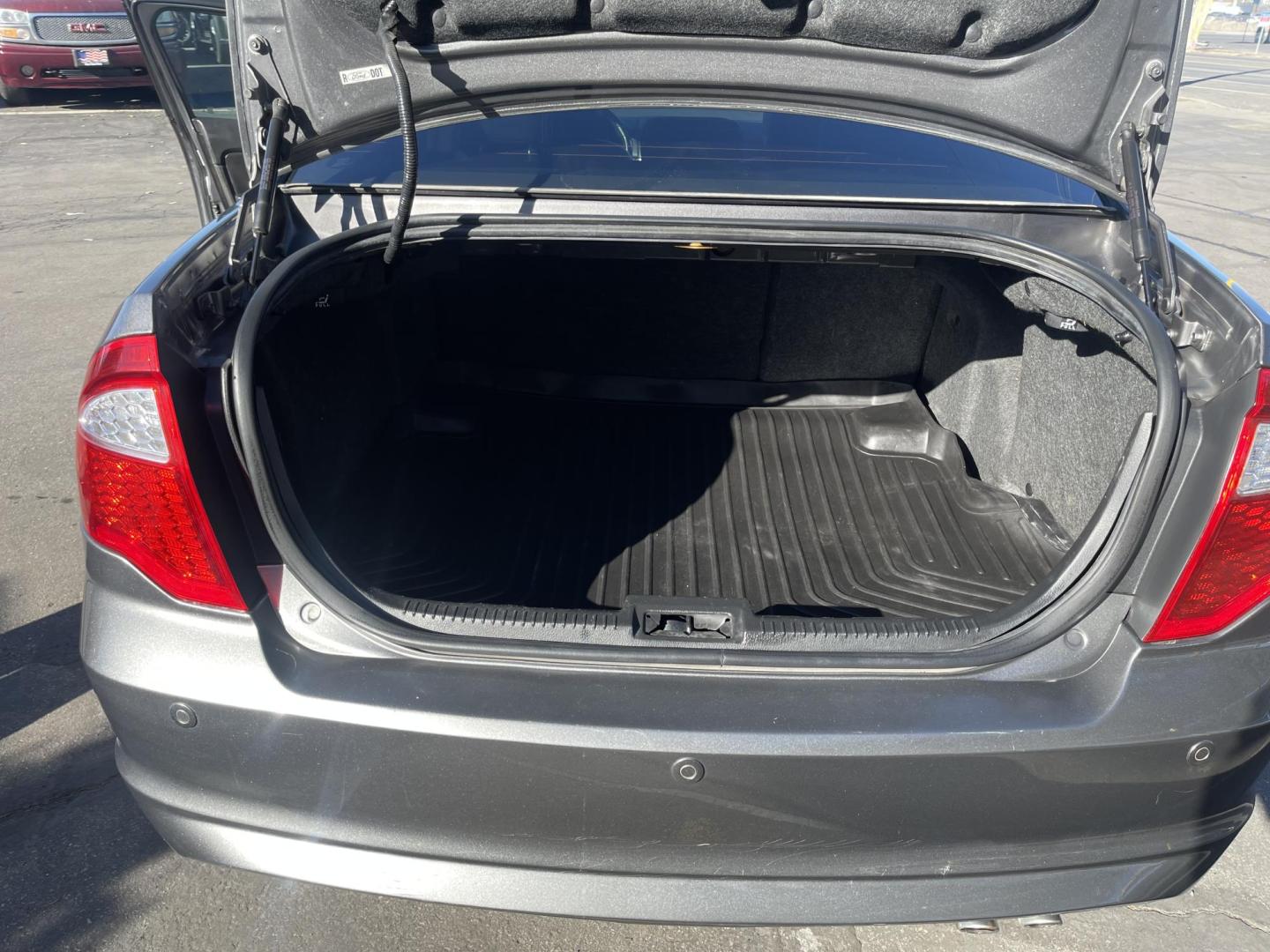 2012 Sterling Gray Metallic /Black Leather Ford Fusion SEL (3FAHP0JA4CR) with an 2.5L 4 Cyl. engine, Automatic transmission, located at 801 South State Street, Salt Lake City, UT, 84111, (801) 328-0098, 40.751953, -111.888206 - Life is crazy. Now is the time to buy! All of our prices are just dollars above our cost. These prices will change as soon as life isn't so crazy. So please call or come in. We are here to save you a lot of money! Our service department is OPEN DAILY to help with any of your service needs. P - Photo#22