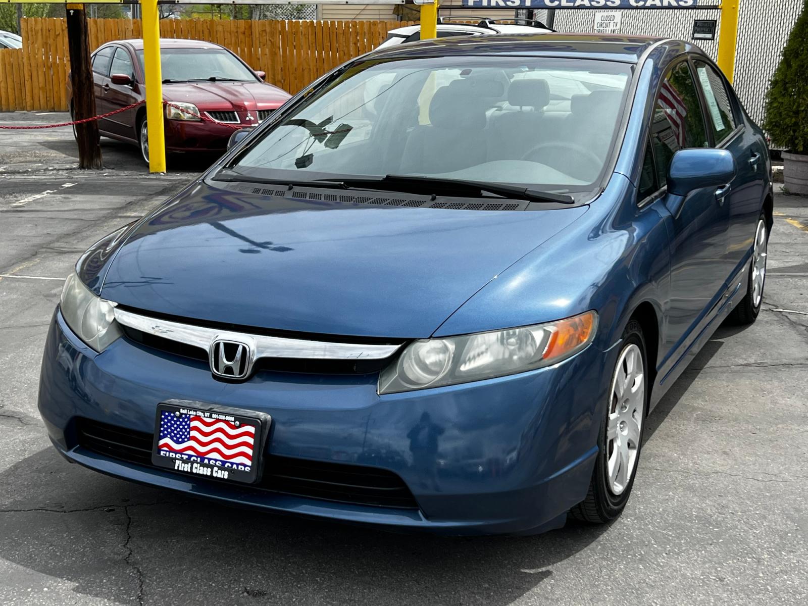 2006 Atomic Blue Metallic /Gray Cloth Honda Civic LX (2HGFA16506H) with an 1.8L 4 Cyl. engine, Automatic transmission, located at 801 South State Street, Salt Lake City, UT, 84111, (801) 328-0098, 40.751953, -111.888206 - Life is crazy. Now is the time to buy! All of our prices are just dollars above our cost. These prices will change as soon as life isn't so crazy. So please call or come in. We are here to save you a lot of money! Our service department is OPEN DAILY to help with any of your service needs. P - Photo #2