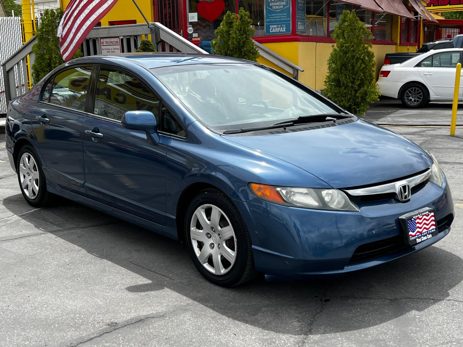 2006 Atomic Blue Metallic /Gray Cloth Honda Civic LX (2HGFA16506H) with an 1.8L 4 Cyl. engine, Automatic transmission, located at 801 South State Street, Salt Lake City, UT, 84111, (801) 328-0098, 40.751953, -111.888206 - Life is crazy. Now is the time to buy! All of our prices are just dollars above our cost. These prices will change as soon as life isn't so crazy. So please call or come in. We are here to save you a lot of money! Our service department is OPEN DAILY to help with any of your service needs. P - Photo #4