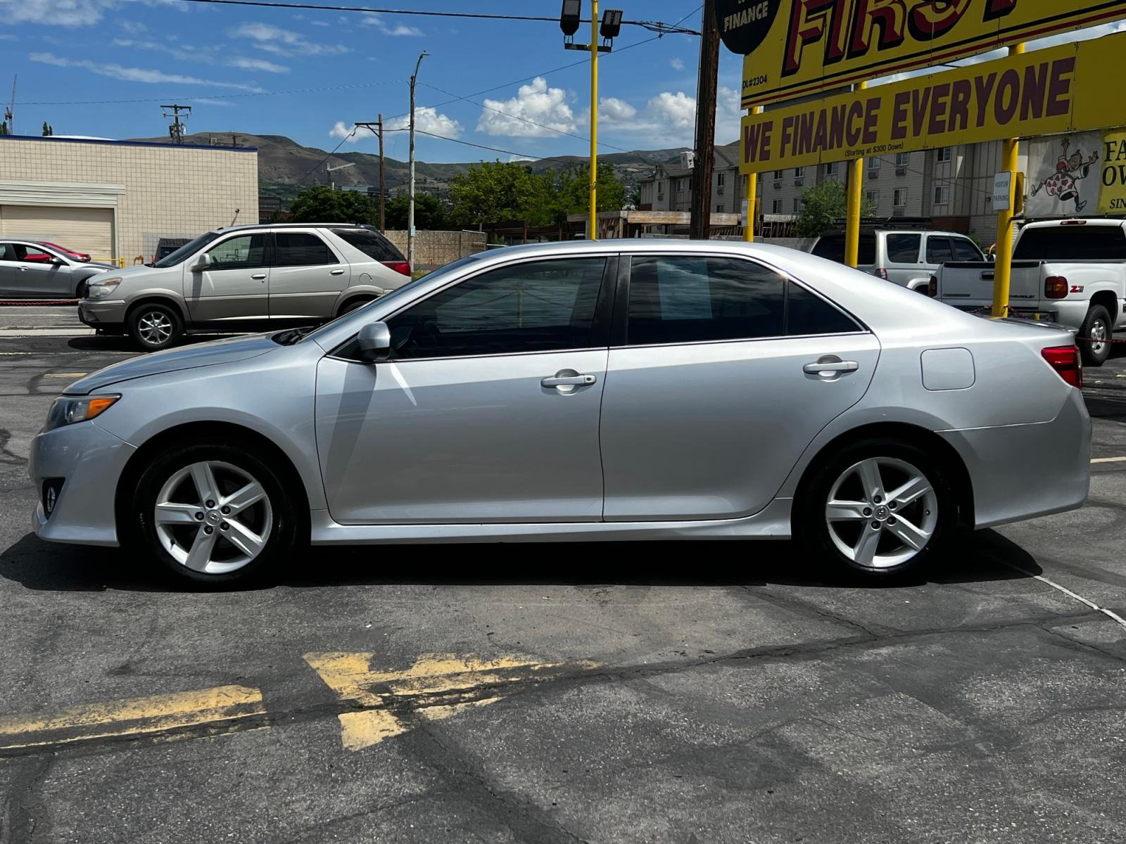 2014 Silver Streak Mica /Black Toyota Camry SE (4T1BF1FK9EU) with an 2.5L 4 Cyl. engine, Automatic transmission, located at 801 South State Street, Salt Lake City, UT, 84111, (801) 328-0098, 40.751953, -111.888206 - Life is crazy. Now is the time to buy! All of our prices are just dollars above our cost. These prices will change as soon as life isn't so crazy. So please call or come in. We are here to save you a lot of money! Our service department is OPEN DAILY to help with any of your service needs. P - Photo #1