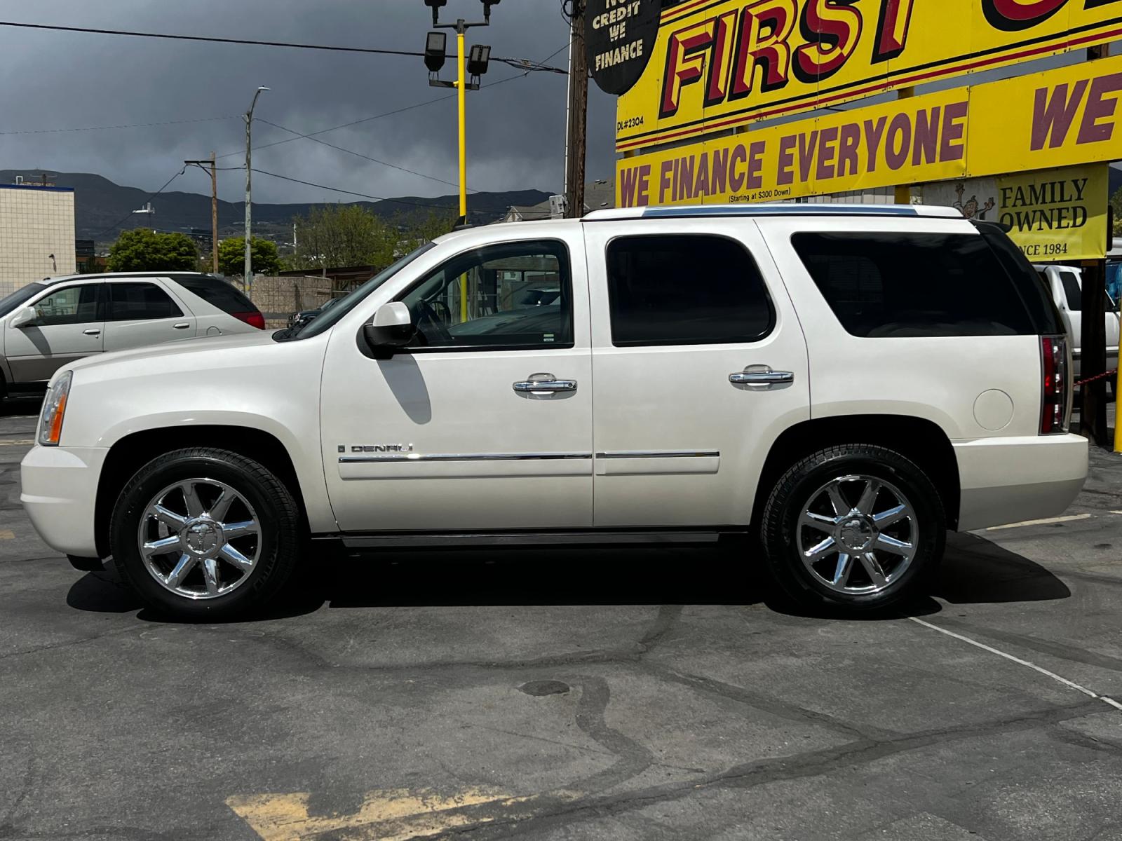 2009 White /Black Leather GMC Yukon Denali Denali 4WD (1GKFK03239R) with an 6.2L V8 engine, Automatic transmission, located at 801 South State Street, Salt Lake City, UT, 84111, (801) 328-0098, 40.751953, -111.888206 - Life is crazy. Now is the time to buy! All of our prices are just dollars above our cost. These prices will change as soon as life isn't so crazy. So please call or come in. We are here to save you a lot of money! Our service department is OPEN DAILY to help with any of your service needs. P - Photo #1