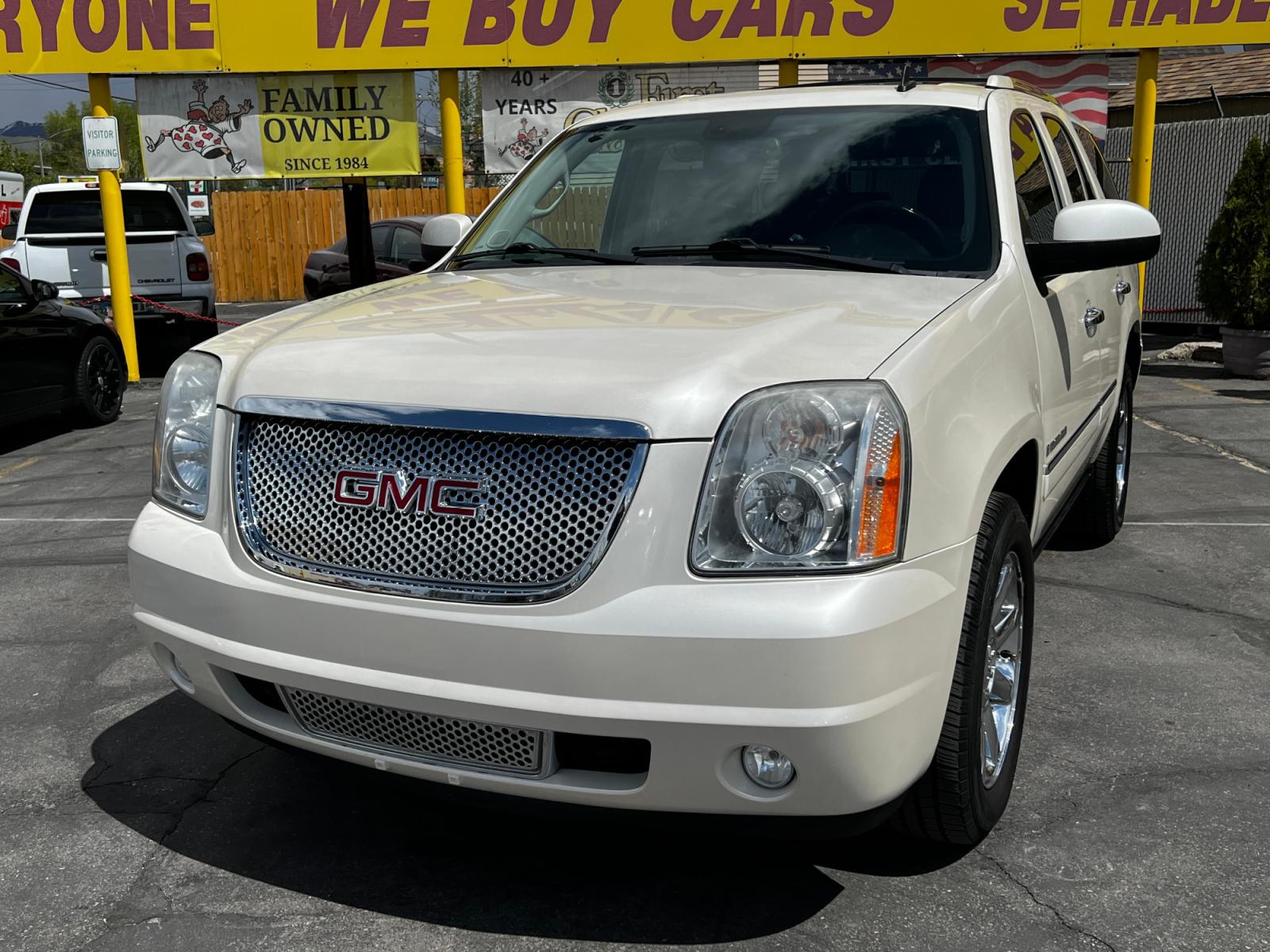 2009 White /Black Leather GMC Yukon Denali Denali 4WD (1GKFK03239R) with an 6.2L V8 engine, Automatic transmission, located at 801 South State Street, Salt Lake City, UT, 84111, (801) 328-0098, 40.751953, -111.888206 - Life is crazy. Now is the time to buy! All of our prices are just dollars above our cost. These prices will change as soon as life isn't so crazy. So please call or come in. We are here to save you a lot of money! Our service department is OPEN DAILY to help with any of your service needs. P - Photo #2