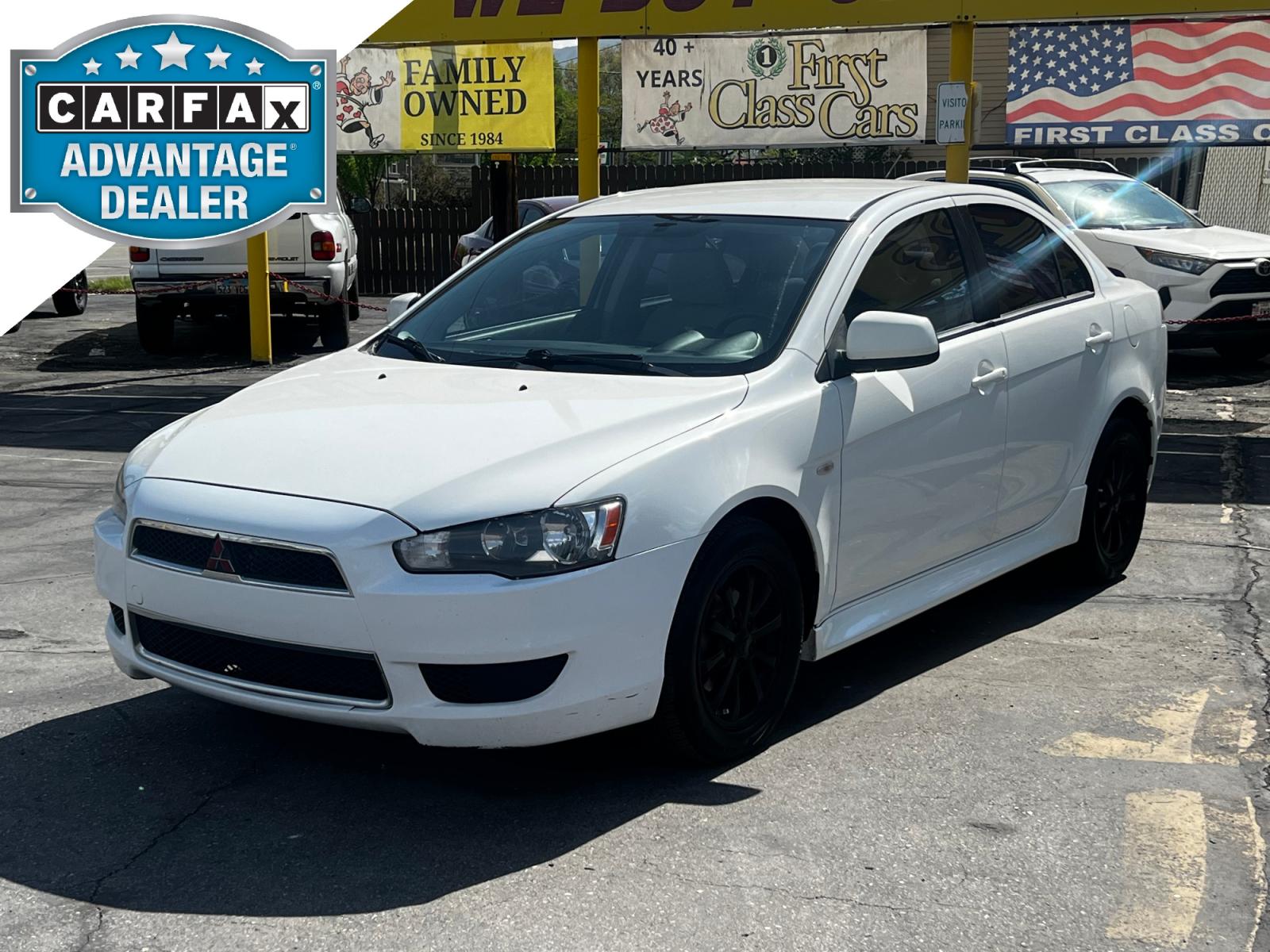 2012 Fairy White /Tan Cloth Mitsubishi Lancer SE (JA32V2FW4CU) with an 2.4L 4 Cyl. engine, Automatic transmission, located at 801 South State Street, Salt Lake City, UT, 84111, (801) 328-0098, 40.751953, -111.888206 - Life is crazy. Now is the time to buy! All of our prices are just dollars above our cost. These prices will change as soon as life isn't so crazy. So please call or come in. We are here to save you a lot of money! Our service department is OPEN DAILY to help with any of your service needs. P - Photo #0