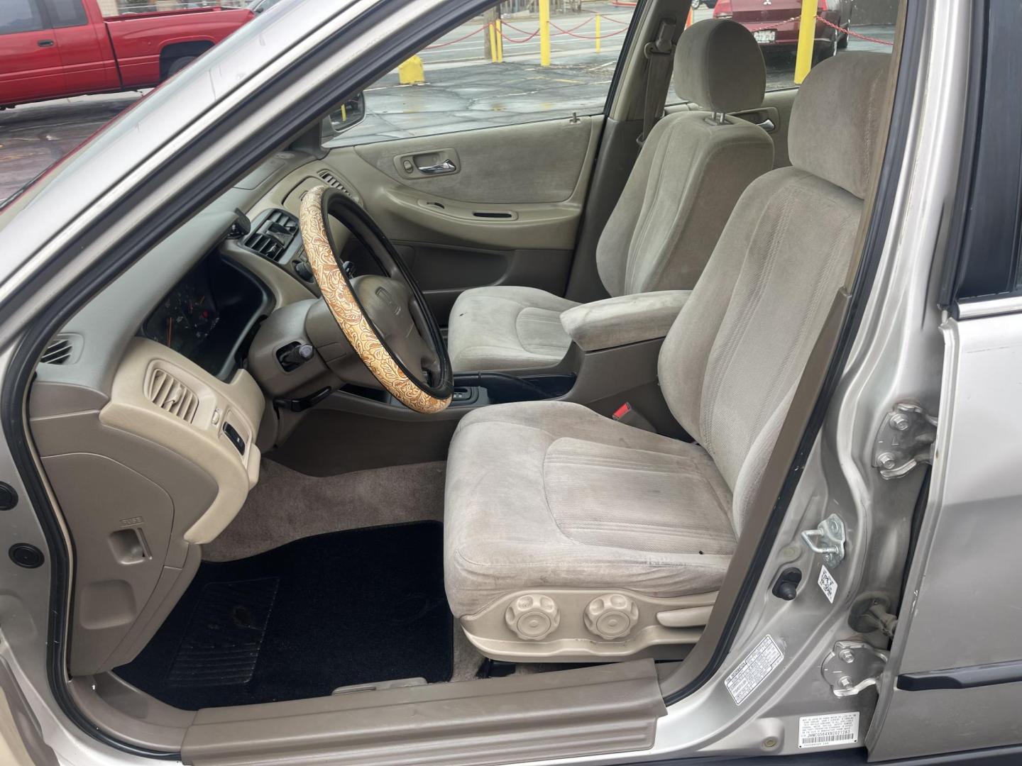 1999 Naples Gold Metallic /Tan Cloth Honda Accord LX sedan (JHMCG564XXC) with an 2.3L 4 Cyl. engine, Automatic transmission, located at 801 South State Street, Salt Lake City, UT, 84111, (801) 328-0098, 40.751953, -111.888206 - Vehicle Features: LX Model, AM/FM Stereo, Air Conditioning, Automatic Transmission, Cassette Player, Cloth Seats, Cruise Control, Power Locks, Power Mirrors, Power Windows, Rear Defroster Our service department is OPEN DAILY to help with any of your service needs. Please call for immediate appointm - Photo#7
