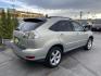 2004 Bamboo Pearl /Tan Leather Lexus RX 330 4WD (JTJHA31U140) with an 3.3L V6 engine, Automatic transmission, located at 801 South State Street, Salt Lake City, UT, 84111, (801) 328-0098, 40.751953, -111.888206 - Clean Title!! Extra clean!! Immaculate condition!! Free Carfax!! Must see!! Warranty available!! Free Carfax!!! Vehicle Features:4WD/AWD, ABS Brakes, AM/FM Stereo, Air Conditioning, Alloy Wheels, Automatic Transmission, CD Audio, Cassette Player, Cruise Control, Front Seat Heaters, Leather Seat - Photo#5