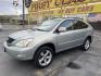 2004 Bamboo Pearl /Tan Leather Lexus RX 330 4WD (JTJHA31U140) with an 3.3L V6 engine, Automatic transmission, located at 801 South State Street, Salt Lake City, UT, 84111, (801) 328-0098, 40.751953, -111.888206 - Clean Title!! Extra clean!! Immaculate condition!! Free Carfax!! Must see!! Warranty available!! Free Carfax!!! Vehicle Features:4WD/AWD, ABS Brakes, AM/FM Stereo, Air Conditioning, Alloy Wheels, Automatic Transmission, CD Audio, Cassette Player, Cruise Control, Front Seat Heaters, Leather Seat - Photo#9