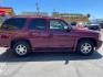 2005 Sport Red Metallic /Gray Leather GMC Yukon Denali Denali (1GKEK63U55J) with an 6.0L V8 engine, Automatic transmission, located at 801 South State Street, Salt Lake City, UT, 84111, (801) 328-0098, 40.751953, -111.888206 - We are here to save you a lot of money! Our service department is OPEN DAILY to help with any of your service needs. Please call for immediate appointment! Clean Title!! Extra clean!! Immaculate condition!! Free Carfax!! Must see!! Warranty available!! Free Carfax!!! Vehicle Features:Dena - Photo#3