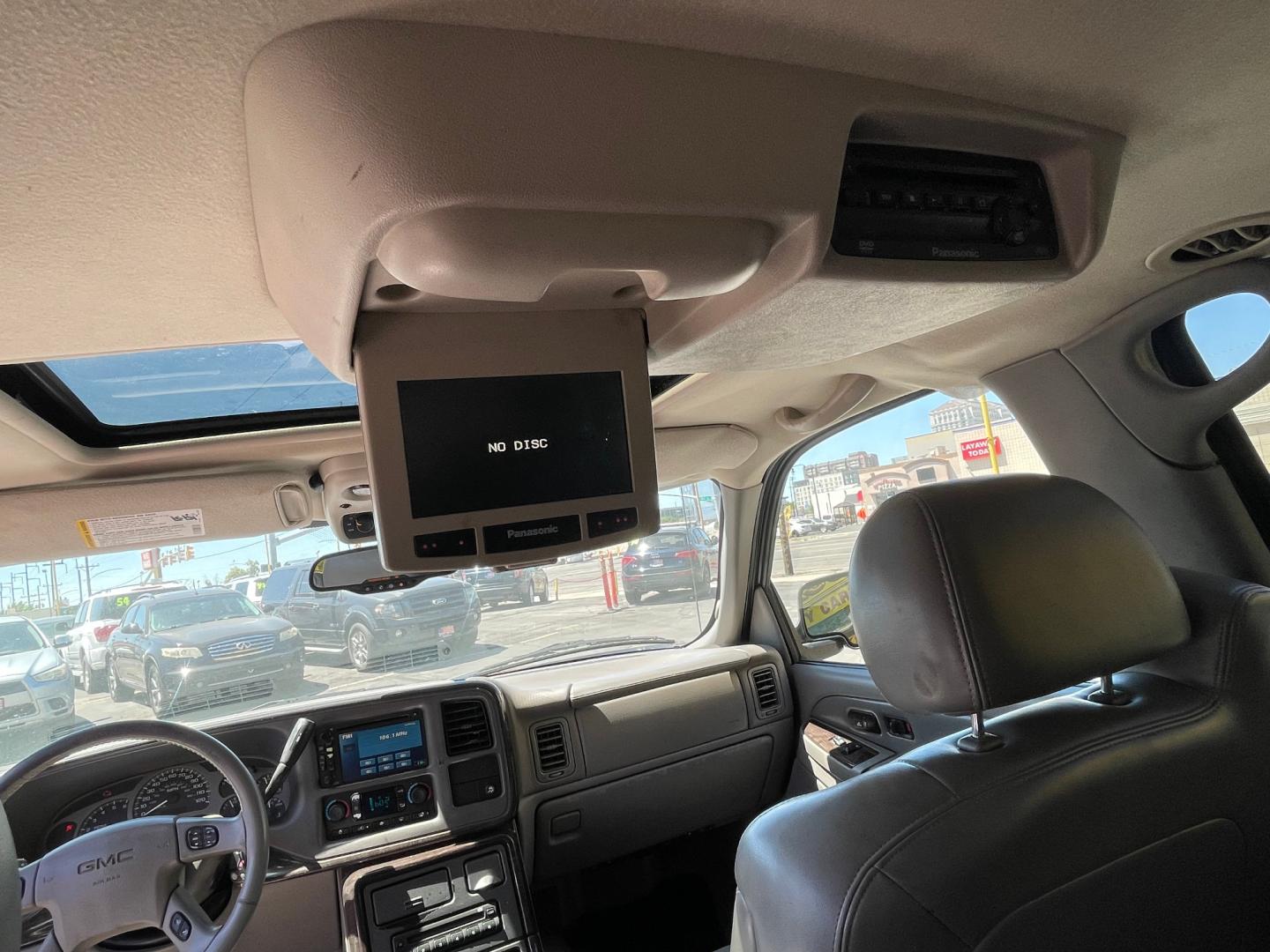 2005 Sport Red Metallic /Gray Leather GMC Yukon Denali Denali (1GKEK63U55J) with an 6.0L V8 engine, Automatic transmission, located at 801 South State Street, Salt Lake City, UT, 84111, (801) 328-0098, 40.751953, -111.888206 - We are here to save you a lot of money! Our service department is OPEN DAILY to help with any of your service needs. Please call for immediate appointment! Clean Title!! Extra clean!! Immaculate condition!! Free Carfax!! Must see!! Warranty available!! Free Carfax!!! Vehicle Features:Dena - Photo#16