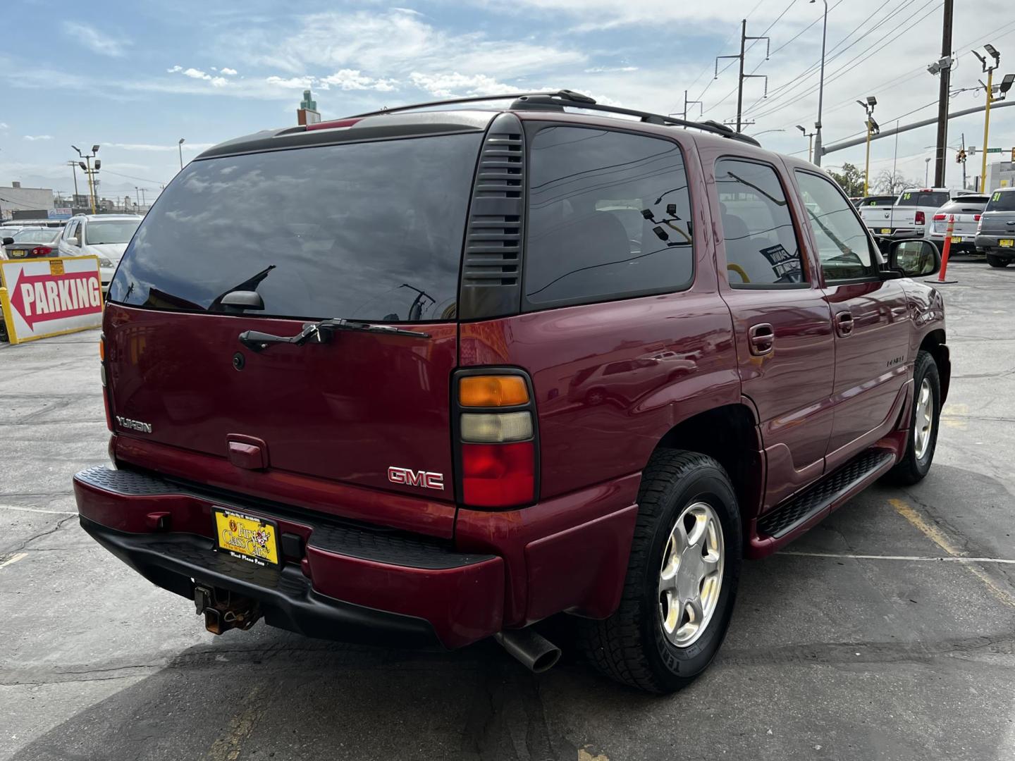 2005 Sport Red Metallic /Gray Leather GMC Yukon Denali Denali (1GKEK63U55J) with an 6.0L V8 engine, Automatic transmission, located at 801 South State Street, Salt Lake City, UT, 84111, (801) 328-0098, 40.751953, -111.888206 - We are here to save you a lot of money! Our service department is OPEN DAILY to help with any of your service needs. Please call for immediate appointment! Clean Title!! Extra clean!! Immaculate condition!! Free Carfax!! Must see!! Warranty available!! Free Carfax!!! Vehicle Features:Dena - Photo#2