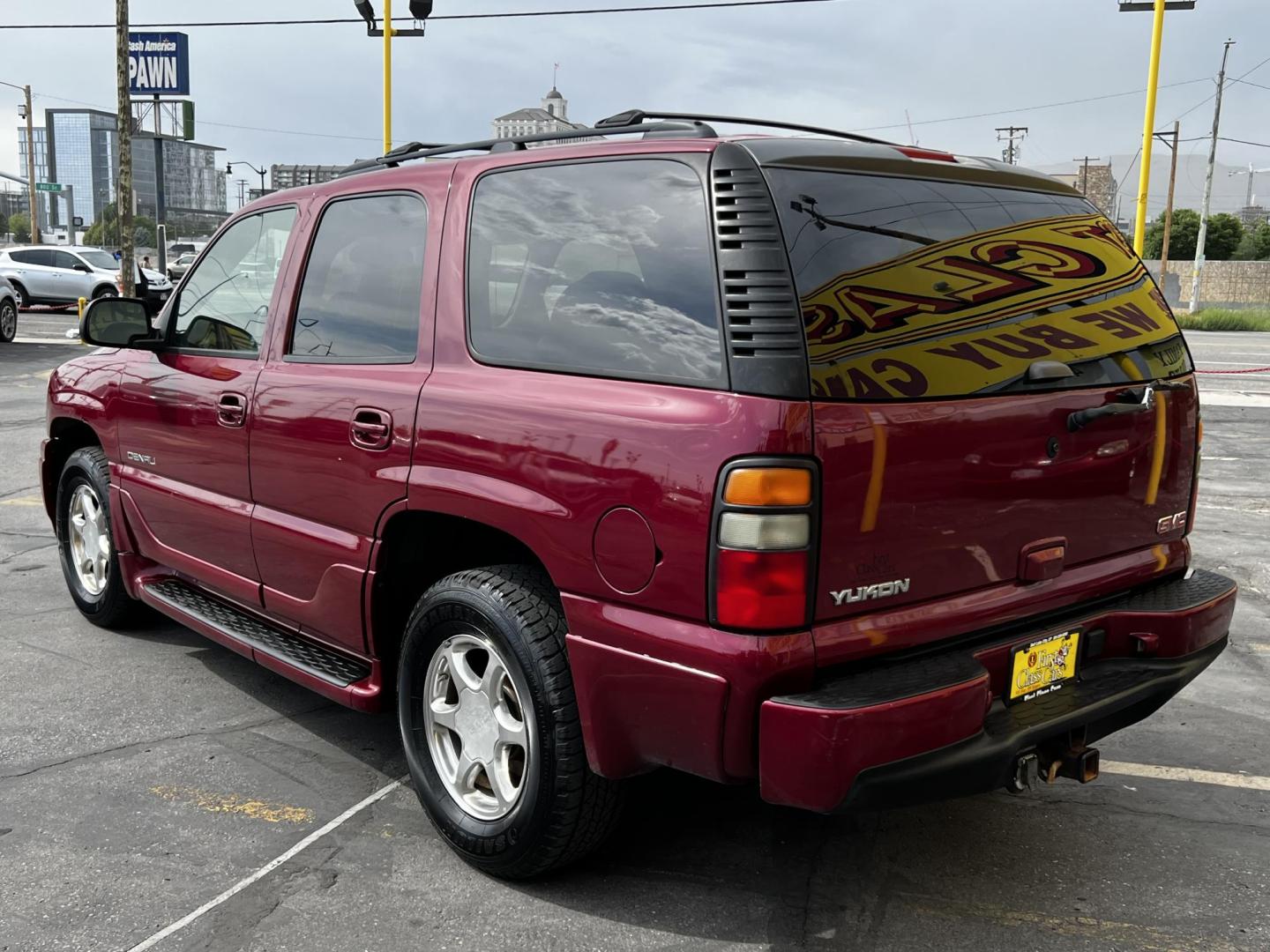 2005 Sport Red Metallic /Gray Leather GMC Yukon Denali Denali (1GKEK63U55J) with an 6.0L V8 engine, Automatic transmission, located at 801 South State Street, Salt Lake City, UT, 84111, (801) 328-0098, 40.751953, -111.888206 - We are here to save you a lot of money! Our service department is OPEN DAILY to help with any of your service needs. Please call for immediate appointment! Clean Title!! Extra clean!! Immaculate condition!! Free Carfax!! Must see!! Warranty available!! Free Carfax!!! Vehicle Features:Dena - Photo#4