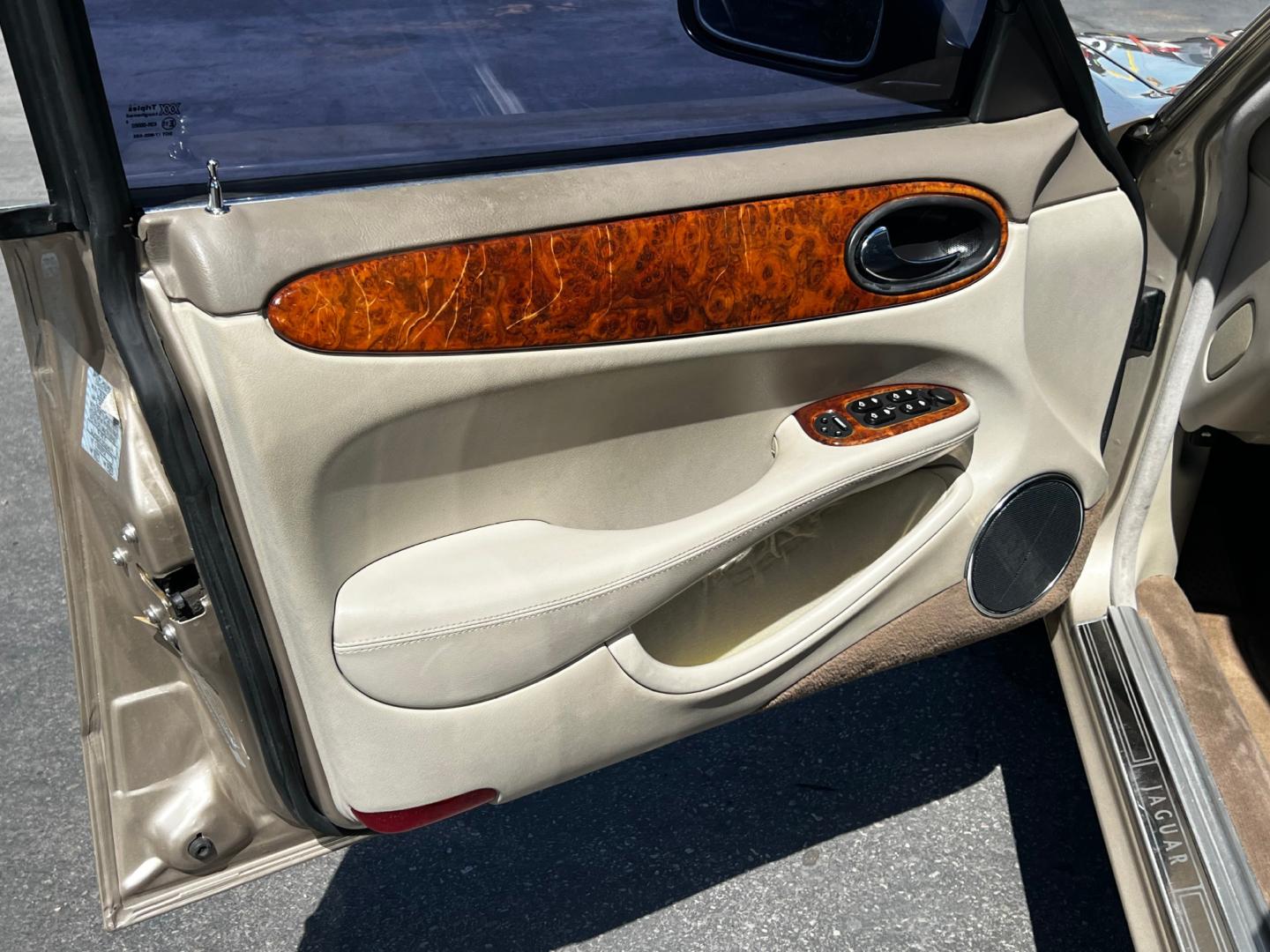 1999 Topaz Metallic /Tan Leather Jaguar XJ Sedan XJ8 L (SAJHX6047XC) with an 4.0L V8 engine, Automatic transmission, located at 801 South State Street, Salt Lake City, UT, 84111, (801) 328-0098, 40.751953, -111.888206 - Life is crazy. Now is the time to buy! All of our prices are just dollars above our cost. These prices will change as soon as life isn't so crazy. So please call or come in. We are here to save you a lot of money! Our service department is OPEN DAILY to help with any of your service needs. Please ca - Photo#12