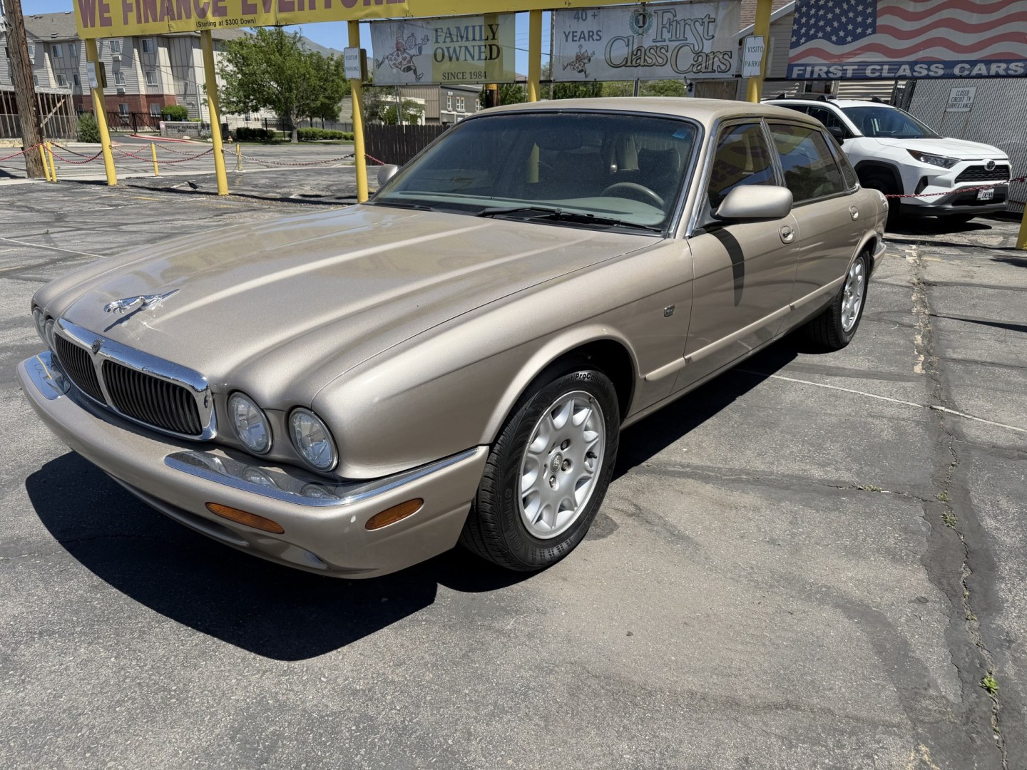 1999 Topaz Metallic /Tan Leather Jaguar XJ Sedan XJ8 L (SAJHX6047XC) with an 4.0L V8 engine, Automatic transmission, located at 801 South State Street, Salt Lake City, UT, 84111, (801) 328-0098, 40.751953, -111.888206 - Life is crazy. Now is the time to buy! All of our prices are just dollars above our cost. These prices will change as soon as life isn't so crazy. So please call or come in. We are here to save you a lot of money! Our service department is OPEN DAILY to help with any of your service needs. Please ca - Photo#4