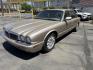 1999 Topaz Metallic /Tan Leather Jaguar XJ Sedan XJ8 L (SAJHX6047XC) with an 4.0L V8 engine, Automatic transmission, located at 801 South State Street, Salt Lake City, UT, 84111, (801) 328-0098, 40.751953, -111.888206 - Life is crazy. Now is the time to buy! All of our prices are just dollars above our cost. These prices will change as soon as life isn't so crazy. So please call or come in. We are here to save you a lot of money! Our service department is OPEN DAILY to help with any of your service needs. Please ca - Photo#4