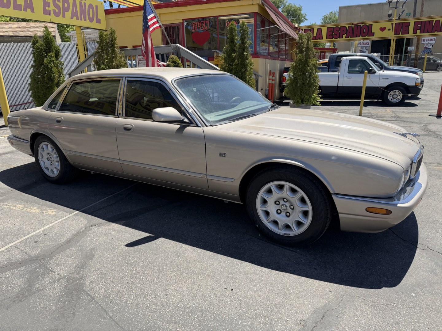 1999 Topaz Metallic /Tan Leather Jaguar XJ Sedan XJ8 L (SAJHX6047XC) with an 4.0L V8 engine, Automatic transmission, located at 801 South State Street, Salt Lake City, UT, 84111, (801) 328-0098, 40.751953, -111.888206 - Life is crazy. Now is the time to buy! All of our prices are just dollars above our cost. These prices will change as soon as life isn't so crazy. So please call or come in. We are here to save you a lot of money! Our service department is OPEN DAILY to help with any of your service needs. Please ca - Photo#6
