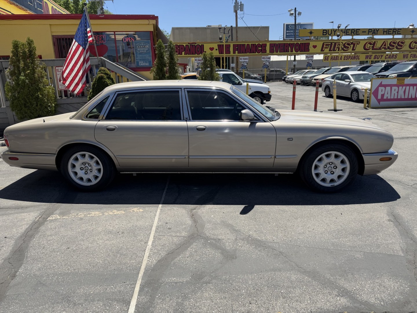 1999 Topaz Metallic /Tan Leather Jaguar XJ Sedan XJ8 L (SAJHX6047XC) with an 4.0L V8 engine, Automatic transmission, located at 801 South State Street, Salt Lake City, UT, 84111, (801) 328-0098, 40.751953, -111.888206 - Life is crazy. Now is the time to buy! All of our prices are just dollars above our cost. These prices will change as soon as life isn't so crazy. So please call or come in. We are here to save you a lot of money! Our service department is OPEN DAILY to help with any of your service needs. Please ca - Photo#7