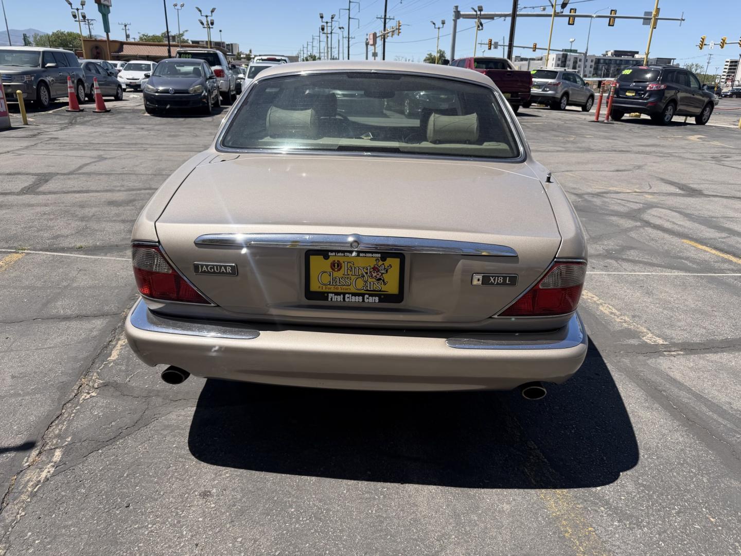1999 Topaz Metallic /Tan Leather Jaguar XJ Sedan XJ8 L (SAJHX6047XC) with an 4.0L V8 engine, Automatic transmission, located at 801 South State Street, Salt Lake City, UT, 84111, (801) 328-0098, 40.751953, -111.888206 - Life is crazy. Now is the time to buy! All of our prices are just dollars above our cost. These prices will change as soon as life isn't so crazy. So please call or come in. We are here to save you a lot of money! Our service department is OPEN DAILY to help with any of your service needs. Please ca - Photo#8