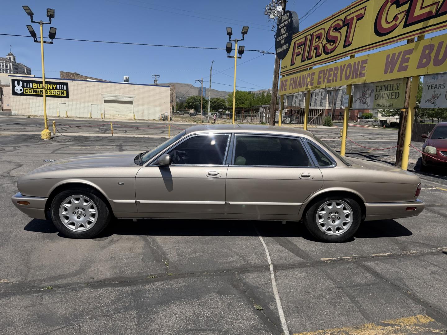 1999 Topaz Metallic /Tan Leather Jaguar XJ Sedan XJ8 L (SAJHX6047XC) with an 4.0L V8 engine, Automatic transmission, located at 801 South State Street, Salt Lake City, UT, 84111, (801) 328-0098, 40.751953, -111.888206 - Life is crazy. Now is the time to buy! All of our prices are just dollars above our cost. These prices will change as soon as life isn't so crazy. So please call or come in. We are here to save you a lot of money! Our service department is OPEN DAILY to help with any of your service needs. Please ca - Photo#10