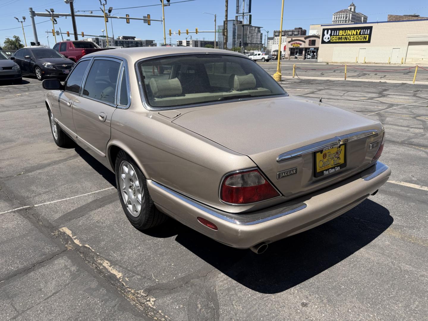 1999 Topaz Metallic /Tan Leather Jaguar XJ Sedan XJ8 L (SAJHX6047XC) with an 4.0L V8 engine, Automatic transmission, located at 801 South State Street, Salt Lake City, UT, 84111, (801) 328-0098, 40.751953, -111.888206 - Life is crazy. Now is the time to buy! All of our prices are just dollars above our cost. These prices will change as soon as life isn't so crazy. So please call or come in. We are here to save you a lot of money! Our service department is OPEN DAILY to help with any of your service needs. Please ca - Photo#9