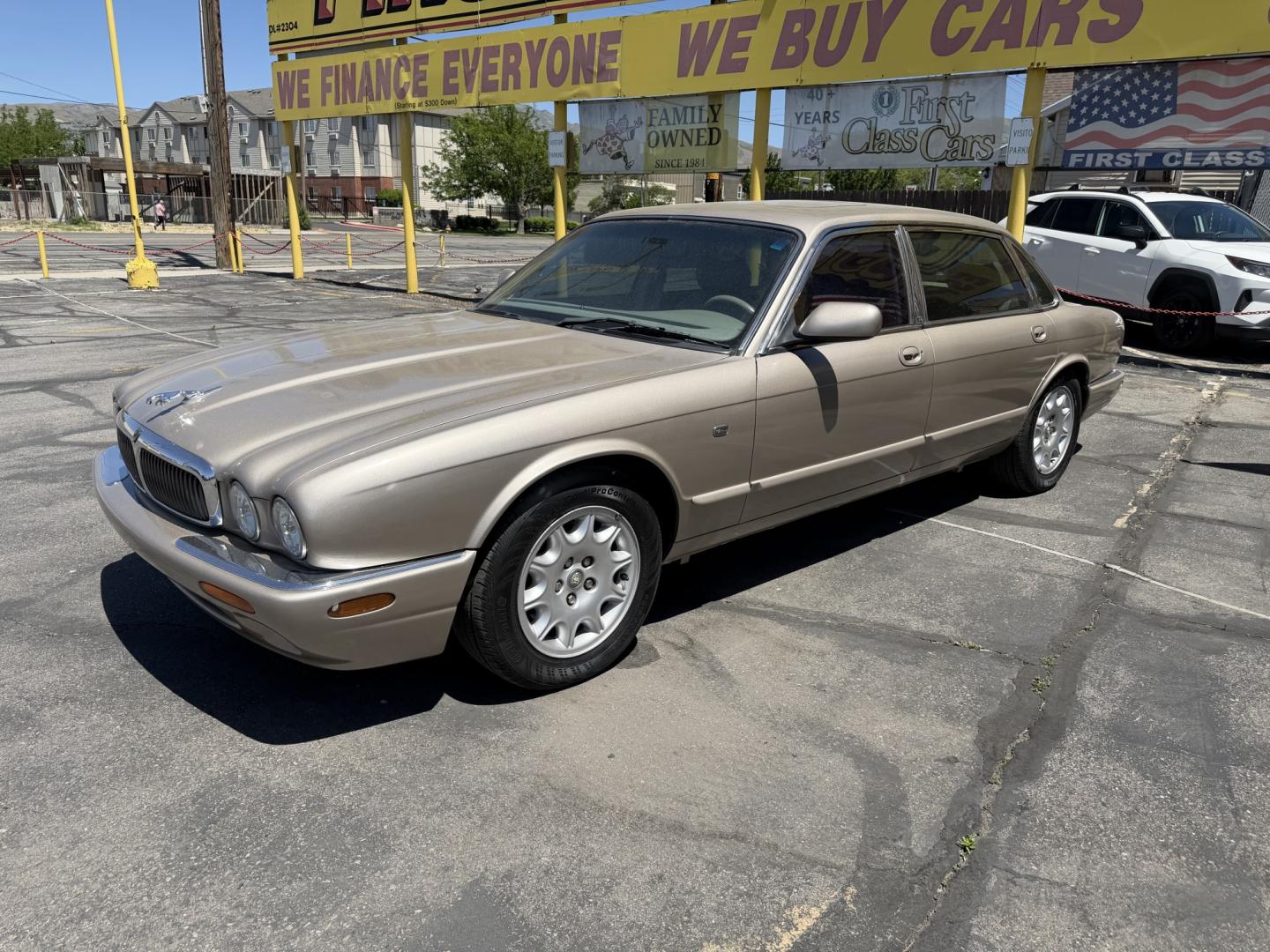 1999 Topaz Metallic /Tan Leather Jaguar XJ Sedan XJ8 L (SAJHX6047XC) with an 4.0L V8 engine, Automatic transmission, located at 801 South State Street, Salt Lake City, UT, 84111, (801) 328-0098, 40.751953, -111.888206 - Life is crazy. Now is the time to buy! All of our prices are just dollars above our cost. These prices will change as soon as life isn't so crazy. So please call or come in. We are here to save you a lot of money! Our service department is OPEN DAILY to help with any of your service needs. Please ca - Photo#11