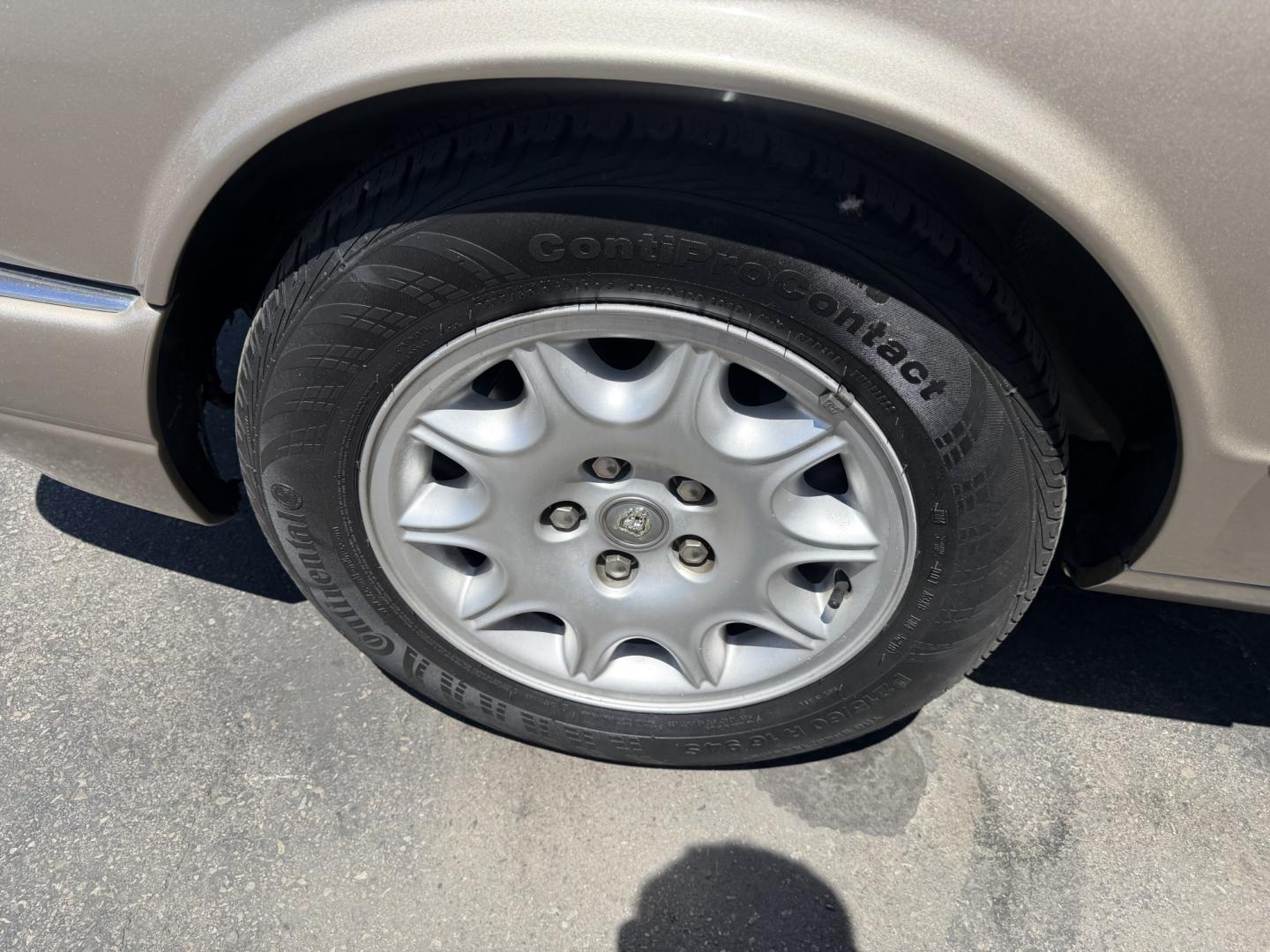 1999 Topaz Metallic /Tan Leather Jaguar XJ Sedan XJ8 L (SAJHX6047XC) with an 4.0L V8 engine, Automatic transmission, located at 801 South State Street, Salt Lake City, UT, 84111, (801) 328-0098, 40.751953, -111.888206 - Life is crazy. Now is the time to buy! All of our prices are just dollars above our cost. These prices will change as soon as life isn't so crazy. So please call or come in. We are here to save you a lot of money! Our service department is OPEN DAILY to help with any of your service needs. Please ca - Photo#12