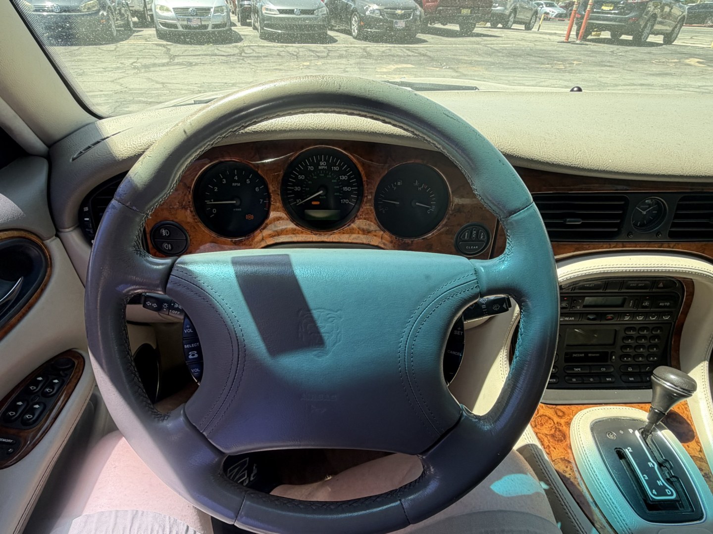 1999 Topaz Metallic /Tan Leather Jaguar XJ Sedan XJ8 L (SAJHX6047XC) with an 4.0L V8 engine, Automatic transmission, located at 801 South State Street, Salt Lake City, UT, 84111, (801) 328-0098, 40.751953, -111.888206 - Life is crazy. Now is the time to buy! All of our prices are just dollars above our cost. These prices will change as soon as life isn't so crazy. So please call or come in. We are here to save you a lot of money! Our service department is OPEN DAILY to help with any of your service needs. Please ca - Photo#2