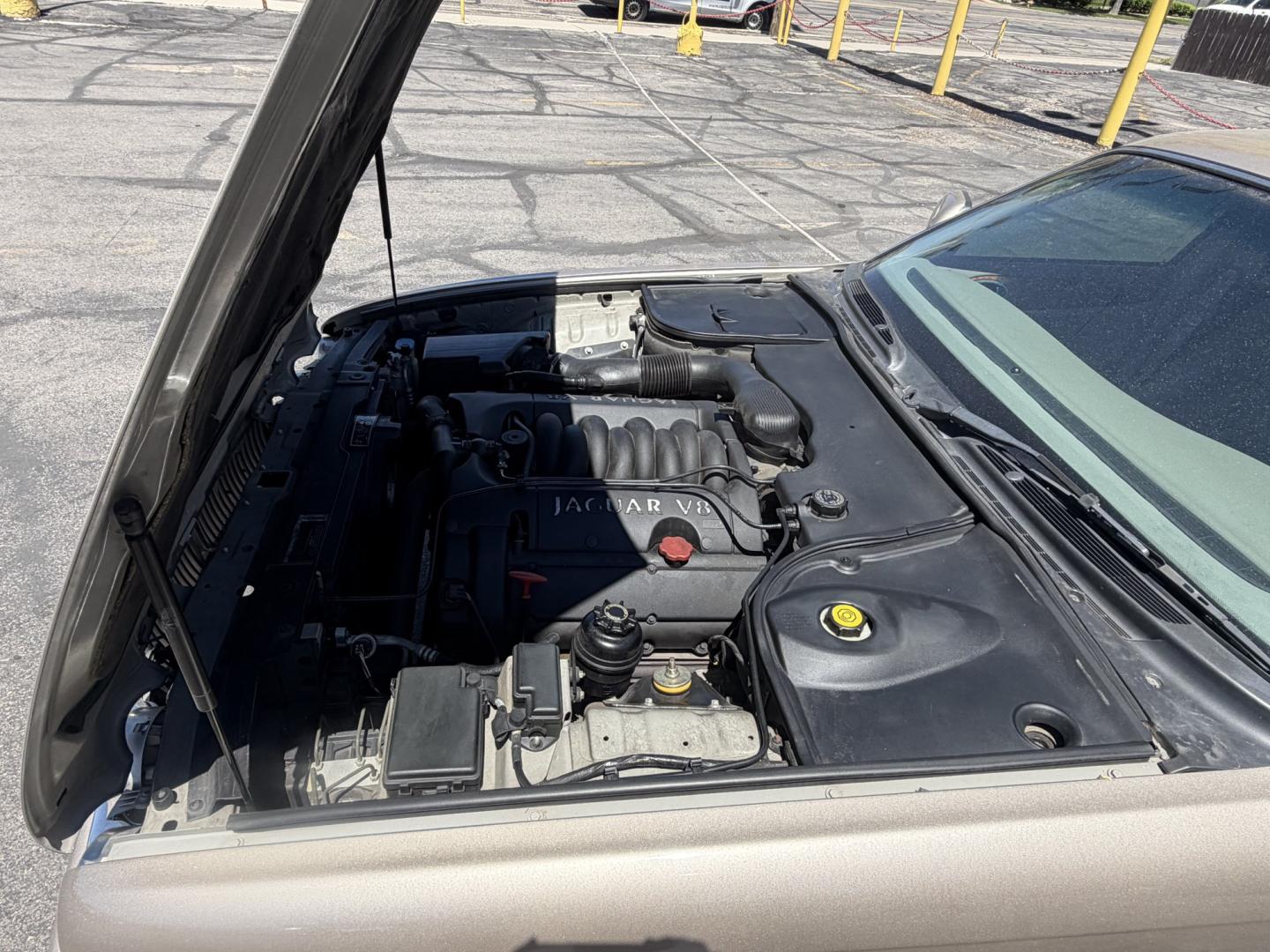 1999 Topaz Metallic /Tan Leather Jaguar XJ Sedan XJ8 L (SAJHX6047XC) with an 4.0L V8 engine, Automatic transmission, located at 801 South State Street, Salt Lake City, UT, 84111, (801) 328-0098, 40.751953, -111.888206 - Life is crazy. Now is the time to buy! All of our prices are just dollars above our cost. These prices will change as soon as life isn't so crazy. So please call or come in. We are here to save you a lot of money! Our service department is OPEN DAILY to help with any of your service needs. Please ca - Photo#21