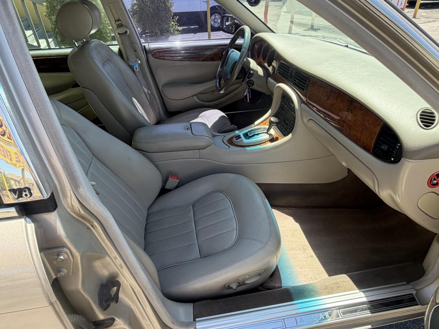1999 Topaz Metallic /Tan Leather Jaguar XJ Sedan XJ8 L (SAJHX6047XC) with an 4.0L V8 engine, Automatic transmission, located at 801 South State Street, Salt Lake City, UT, 84111, (801) 328-0098, 40.751953, -111.888206 - Life is crazy. Now is the time to buy! All of our prices are just dollars above our cost. These prices will change as soon as life isn't so crazy. So please call or come in. We are here to save you a lot of money! Our service department is OPEN DAILY to help with any of your service needs. Please ca - Photo#22