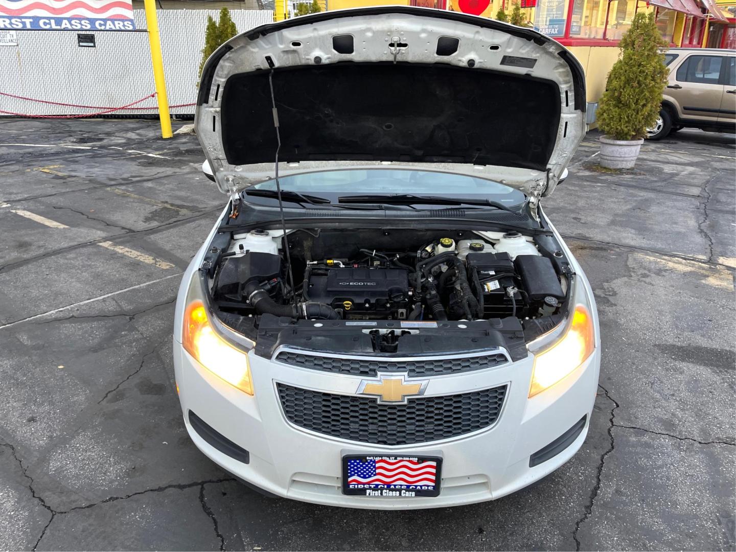 2013 Artic White /TAN Chevrolet Cruze LT (1G1PE5SB6D7) with an 1.4L 4 CYLINDER engine, AUTOMATIC transmission, located at 801 South State Street, Salt Lake City, UT, 84111, (801) 328-0098, 40.751953, -111.888206 - Experience true performance & comfort with this 2013 used Chevrolet Cruze. Outstanding fuel efficiency, seamless connectivity, and sophisticated style - all at an affordable price. Spend less, drive more, and live life to the fullest! Features:ABS Brakes, AM/FM Stereo, Air Conditioning, Alloy Wheel - Photo#10