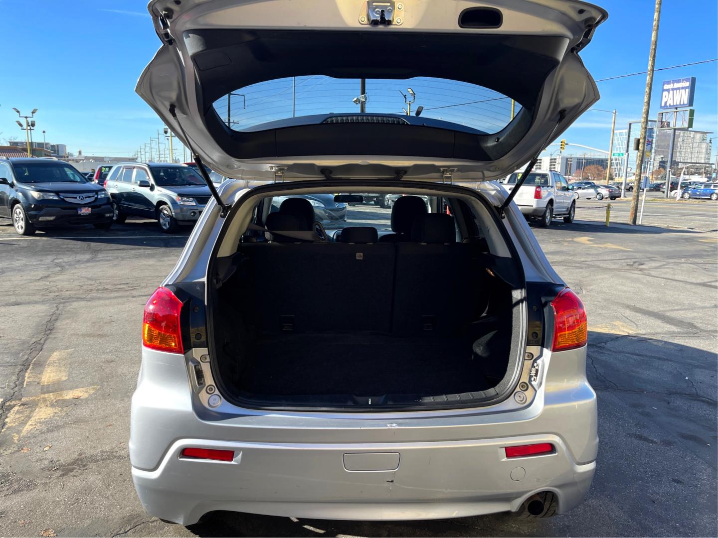 2012 Sunlight Silver Metallic /Black Mitsubishi Outlander Sport ES (JA4AP3AU6CZ) with an 4 Cylinder 2.0L engine, AUTOMATIC transmission, located at 801 South State Street, Salt Lake City, UT, 84111, (801) 328-0098, 40.751953, -111.888206 - Experience a perfect blend of style and power in this 2012 Mitsubishi Outlander Sport. Comes power-packed with smooth handling, comfortable interiors and unbeatable mileage. Grab this fantastic deal for a reliable, used vehicle before it's gone! Your exciting journey starts here. Features:ABS Brake - Photo#12