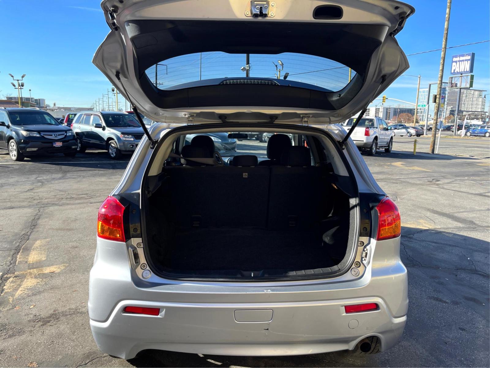 2012 Sunlight Silver Metallic /Black Mitsubishi Outlander Sport ES (JA4AP3AU6CZ) with an 4 Cylinder 2.0L engine, AUTOMATIC transmission, located at 801 South State Street, Salt Lake City, UT, 84111, (801) 328-0098, 40.751953, -111.888206 - Experience a perfect blend of style and power in this 2012 Mitsubishi Outlander Sport. Comes power-packed with smooth handling, comfortable interiors and unbeatable mileage. Grab this fantastic deal for a reliable, used vehicle before it's gone! Your exciting journey starts here. Features:ABS Bra - Photo #12