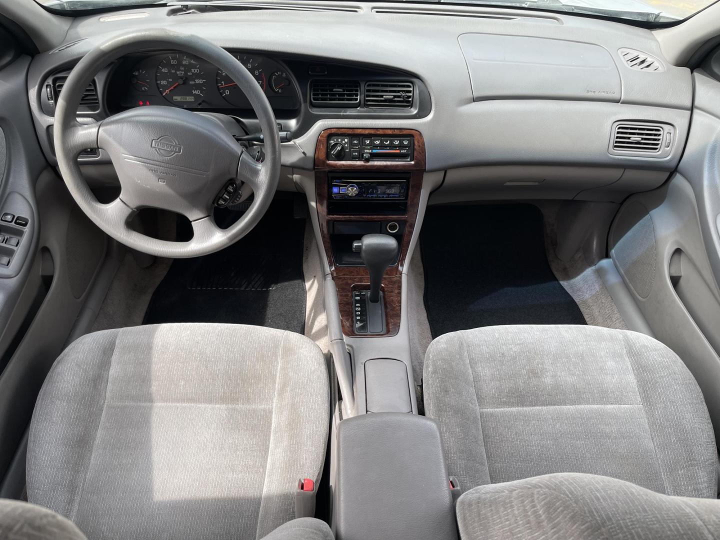 2001 Silver Sky Metallic /Gray Nissan Altima GXE (1N4DL01DX1C) with an 2.4 L 4 Cylinder engine, AUTOMATIC transmission, located at 801 South State Street, Salt Lake City, UT, 84111, (801) 328-0098, 40.751953, -111.888206 - Features:AM/FM Stereo, Air Conditioning, Automatic Transmission, CD Audio, Cloth Seats, Cruise Control, Limited Edition, Power Locks, Power Mirrors, Power Seat(s), Power Windows, Rear Defroster "Immerse yourself in a delightful driving experience with this 2001 Nissan Altima. Adds reliability and s - Photo#11