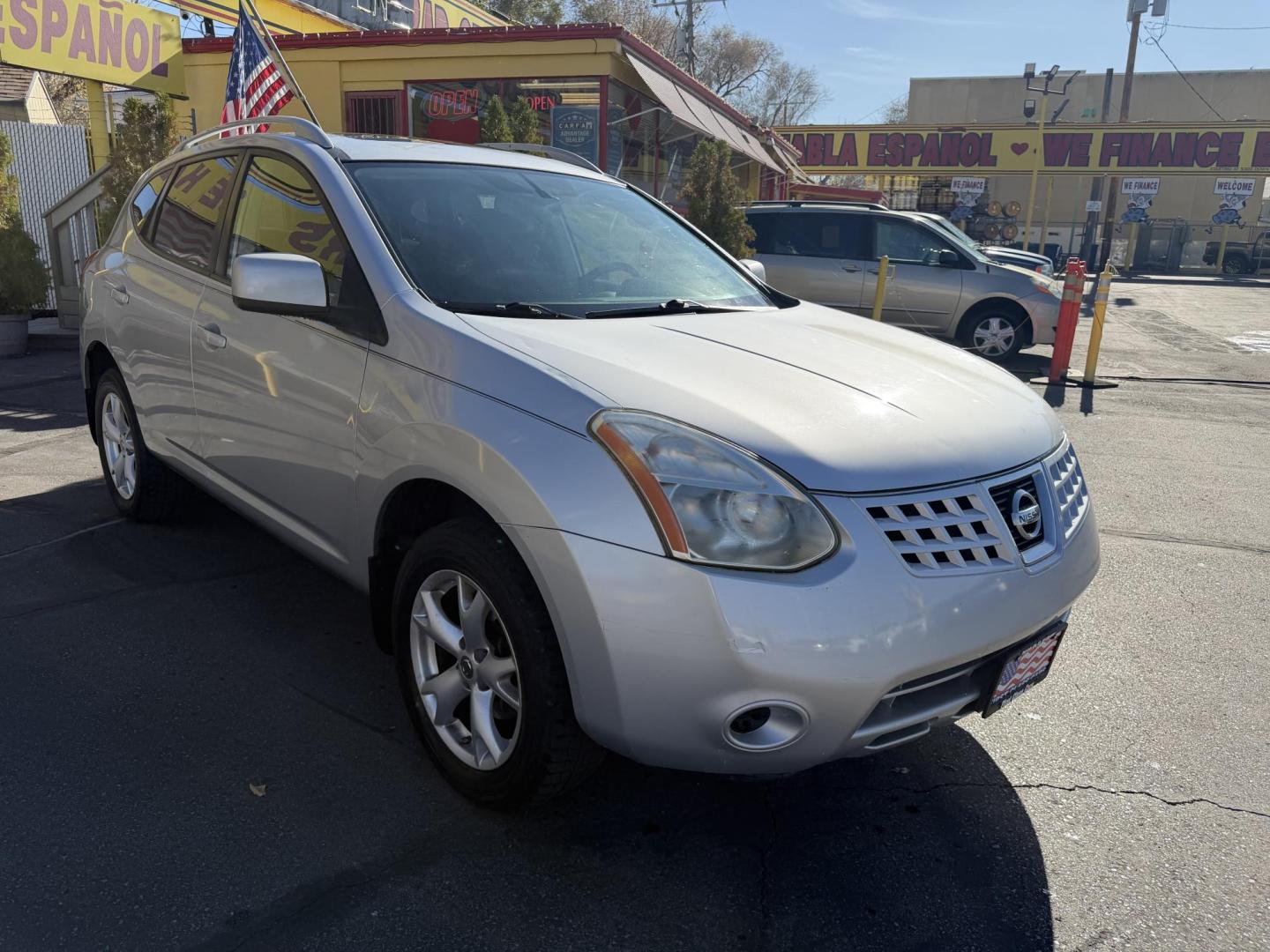 2009 Liquid Silver Metallic /Black Nissan Rogue SL (JN8AS58V29W) with an 2.5L I4 engine, AUTOMATIC transmission, located at 801 South State Street, Salt Lake City, UT, 84111, (801) 328-0098, 40.751953, -111.888206 - Clean title! In great condition! Perfect family suv for winter time! Great in the snow 4x4. Features: 4WD/AWD, ABS Brakes, AM/FM Stereo, Air Conditioning, Alloy Wheels, Automatic Transmission, Auxiliary Audio Input, Bluetooth Technology, CD Audio, Cloth Seats, Cruise Control, Overhead Airbags, Powe - Photo#3