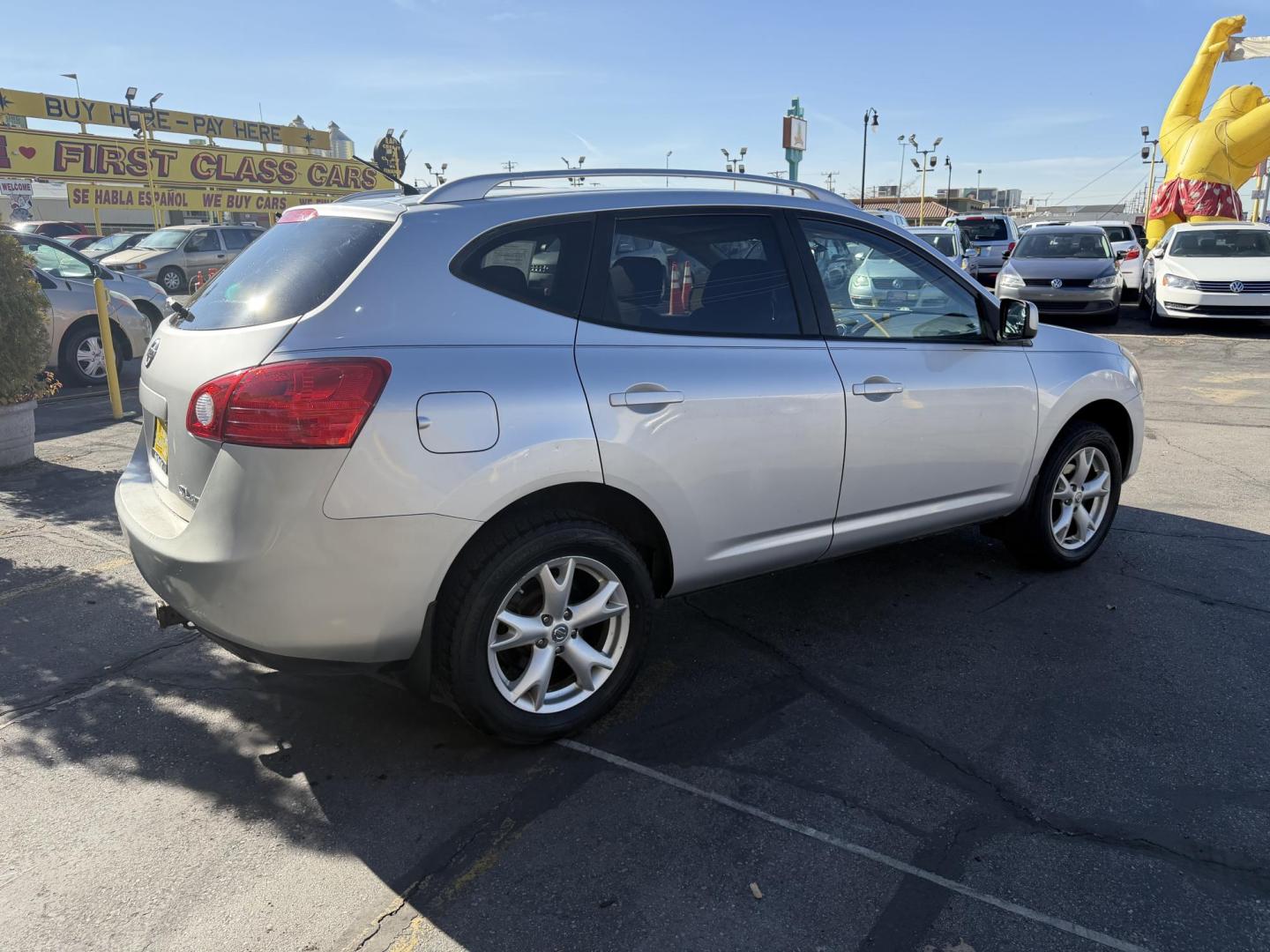 2009 Liquid Silver Metallic /Black Nissan Rogue SL (JN8AS58V29W) with an 2.5L I4 engine, AUTOMATIC transmission, located at 801 South State Street, Salt Lake City, UT, 84111, (801) 328-0098, 40.751953, -111.888206 - Clean title! In great condition! Perfect family suv for winter time! Great in the snow 4x4. Features: 4WD/AWD, ABS Brakes, AM/FM Stereo, Air Conditioning, Alloy Wheels, Automatic Transmission, Auxiliary Audio Input, Bluetooth Technology, CD Audio, Cloth Seats, Cruise Control, Overhead Airbags, Powe - Photo#5